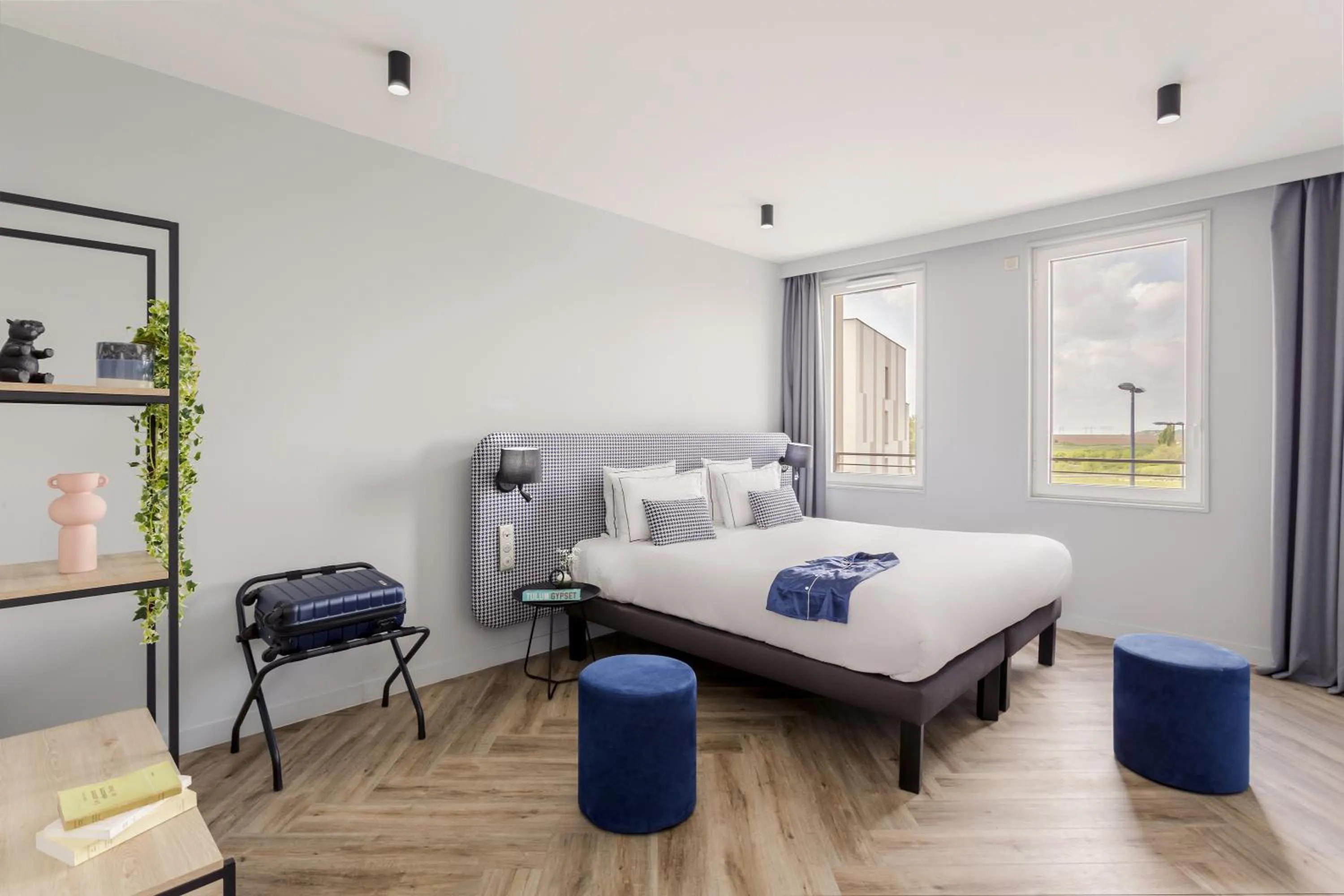 Bed in Appart'City Collection Paris Roissy CDG Airport