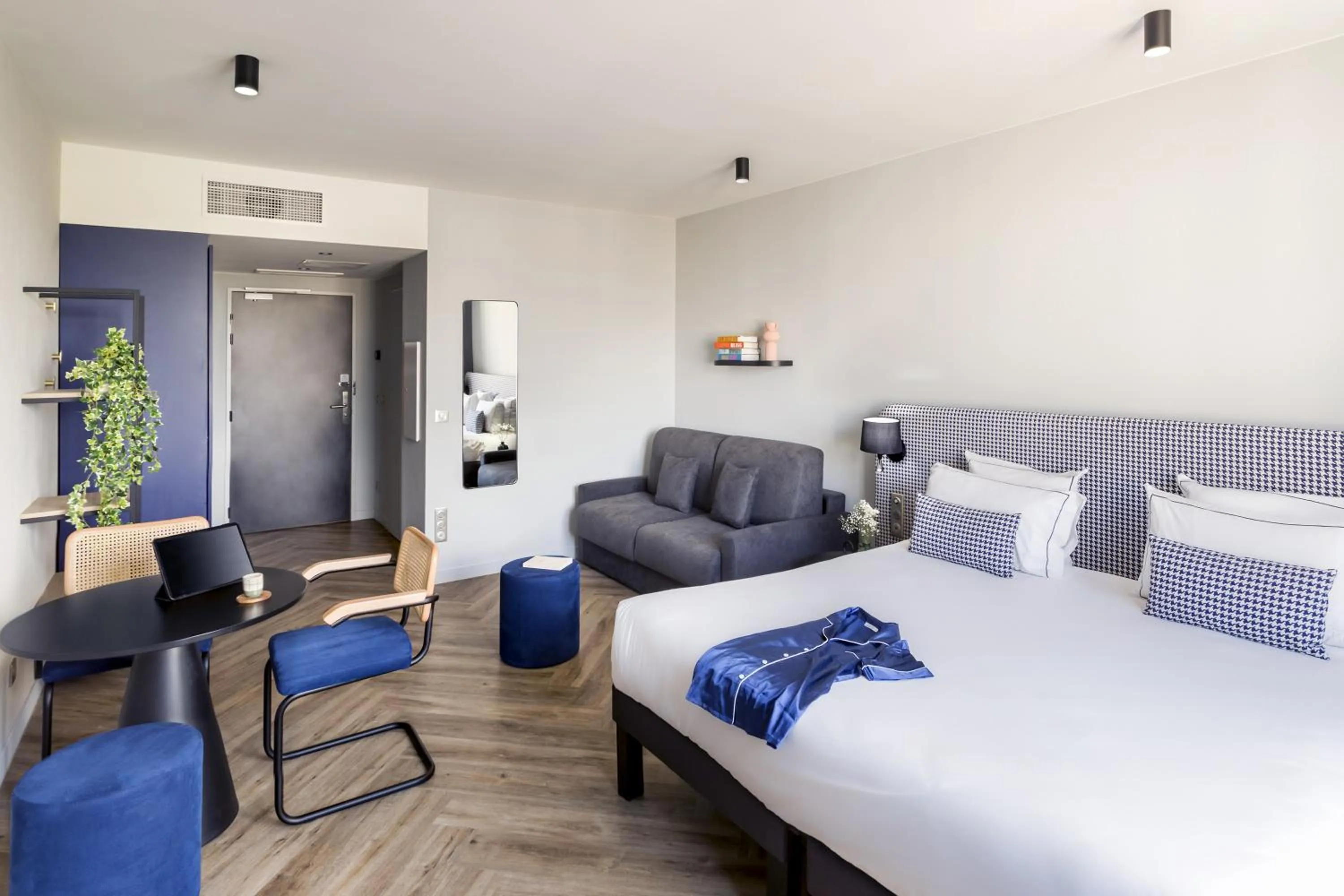 Bed in Appart'City Collection Paris Roissy CDG Airport