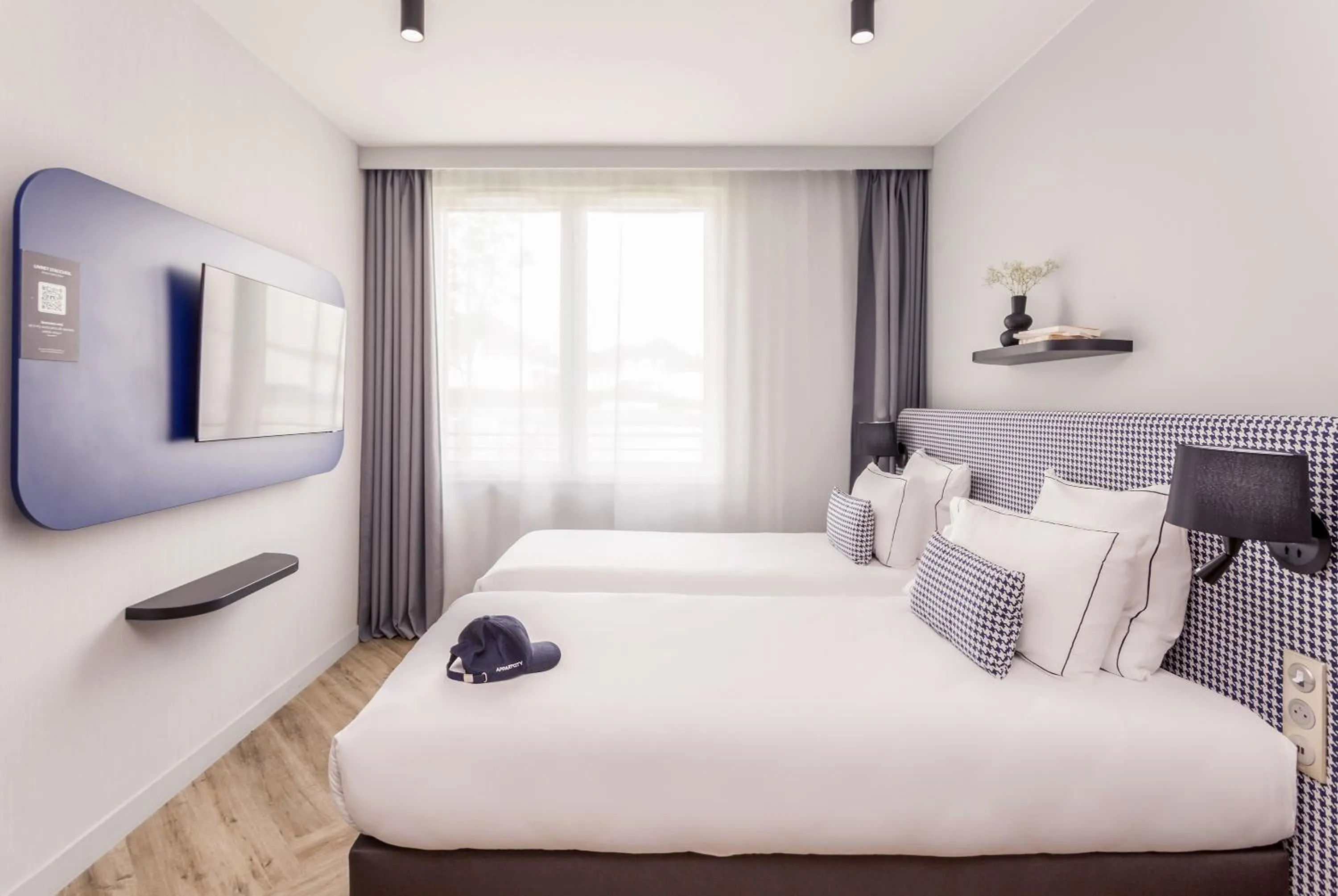 Bed in Appart'City Collection Paris Roissy CDG Airport