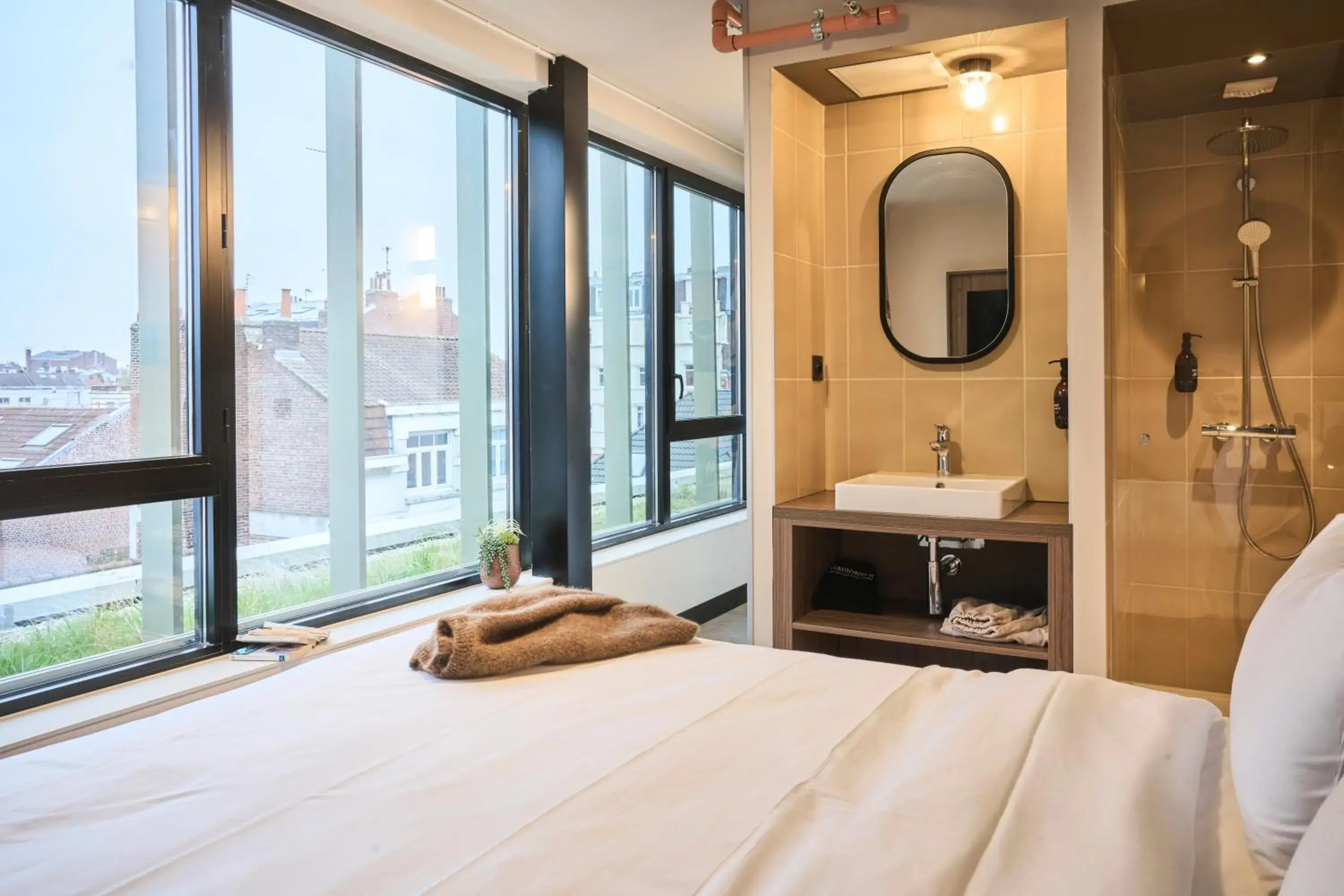 Bed in JOST Hôtel Lille Centre Bed in JOST Hôtel Lille Centre