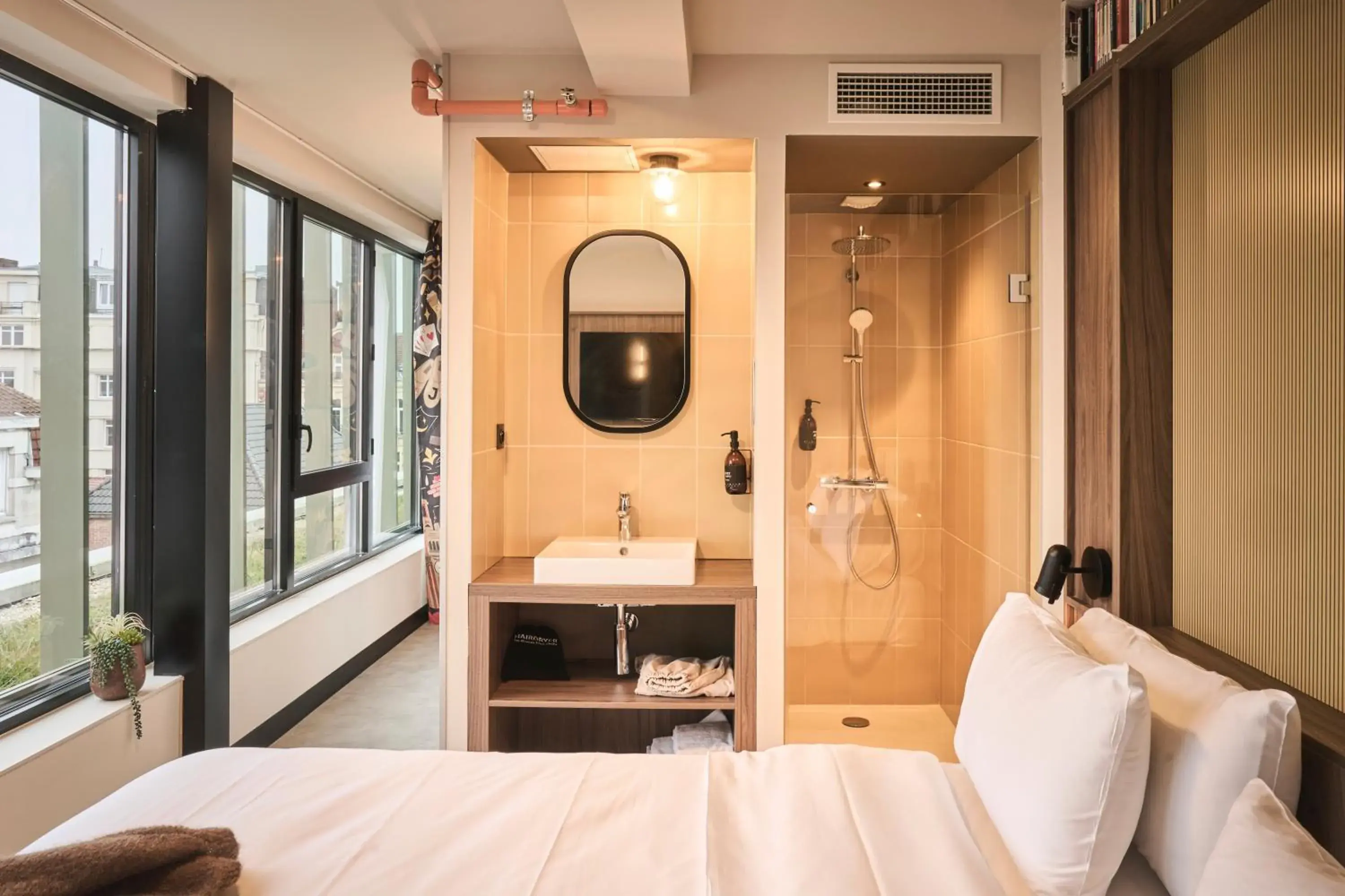 Bed in JOST Hôtel Lille Centre Bed in JOST Hôtel Lille Centre