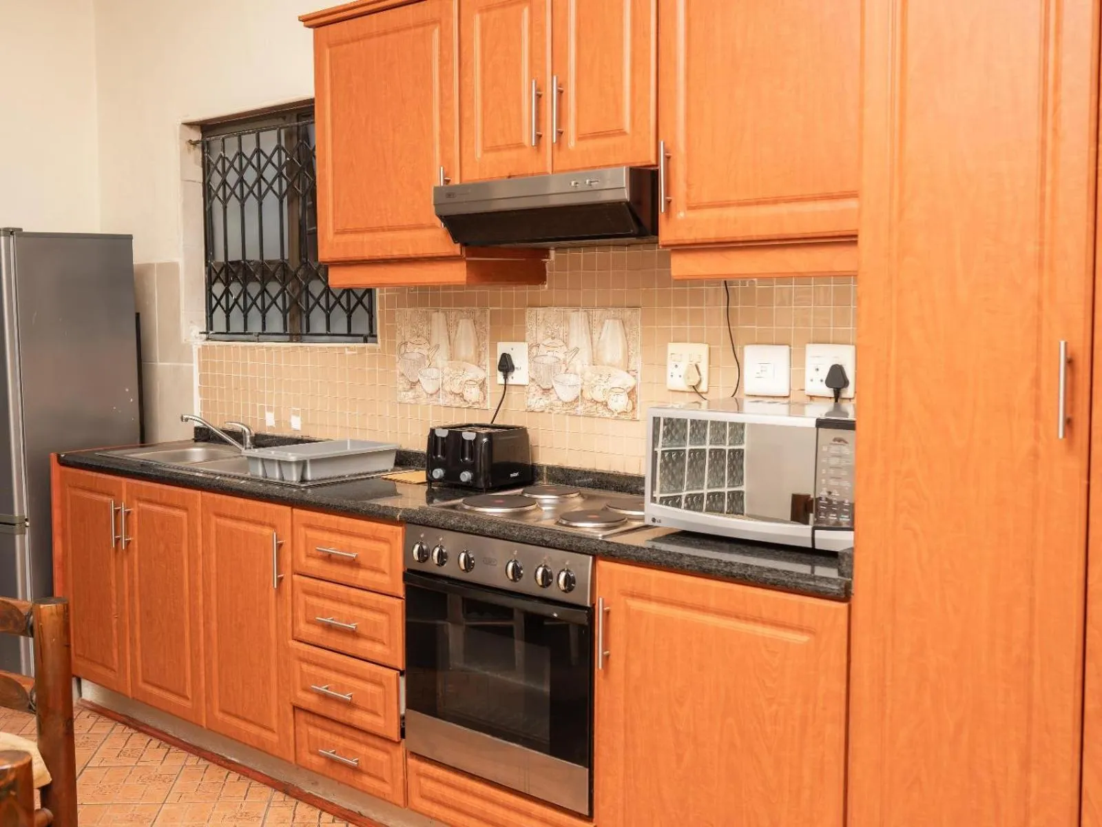 Kitchen or kitchenette in Dolphin Coast B&B / Self catering