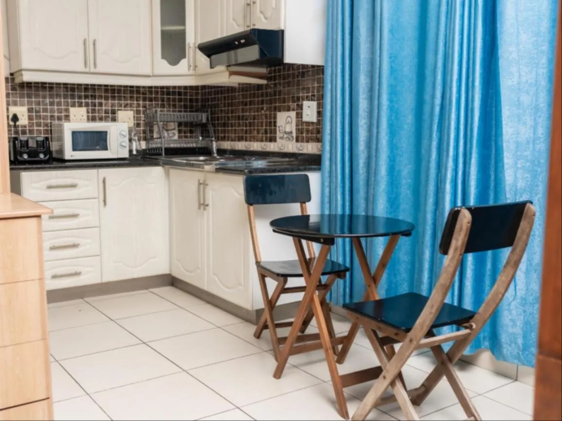 Kitchen or kitchenette in Dolphin Coast B&B / Self catering
