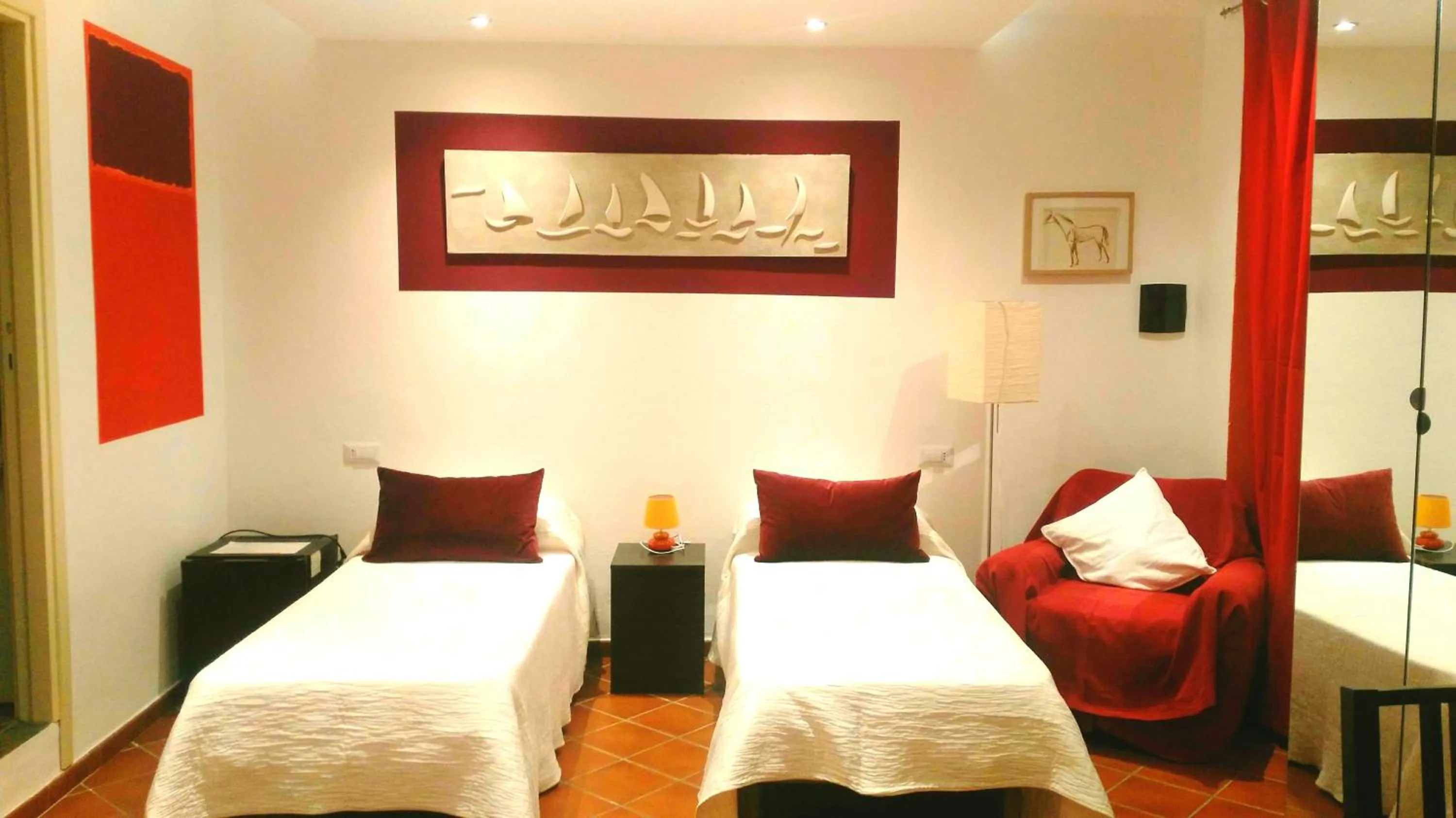 Bed in B&B Domus de Janas Santa Teresa Gallura