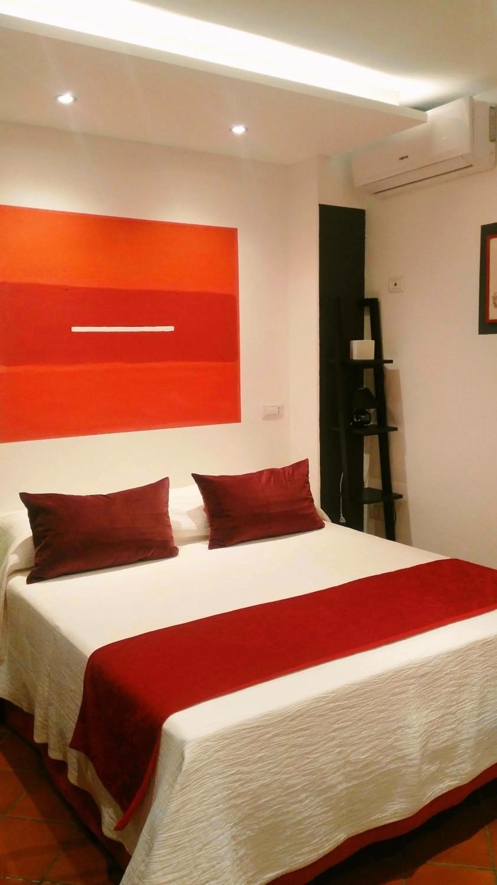 Bed in B&B Domus de Janas Santa Teresa Gallura