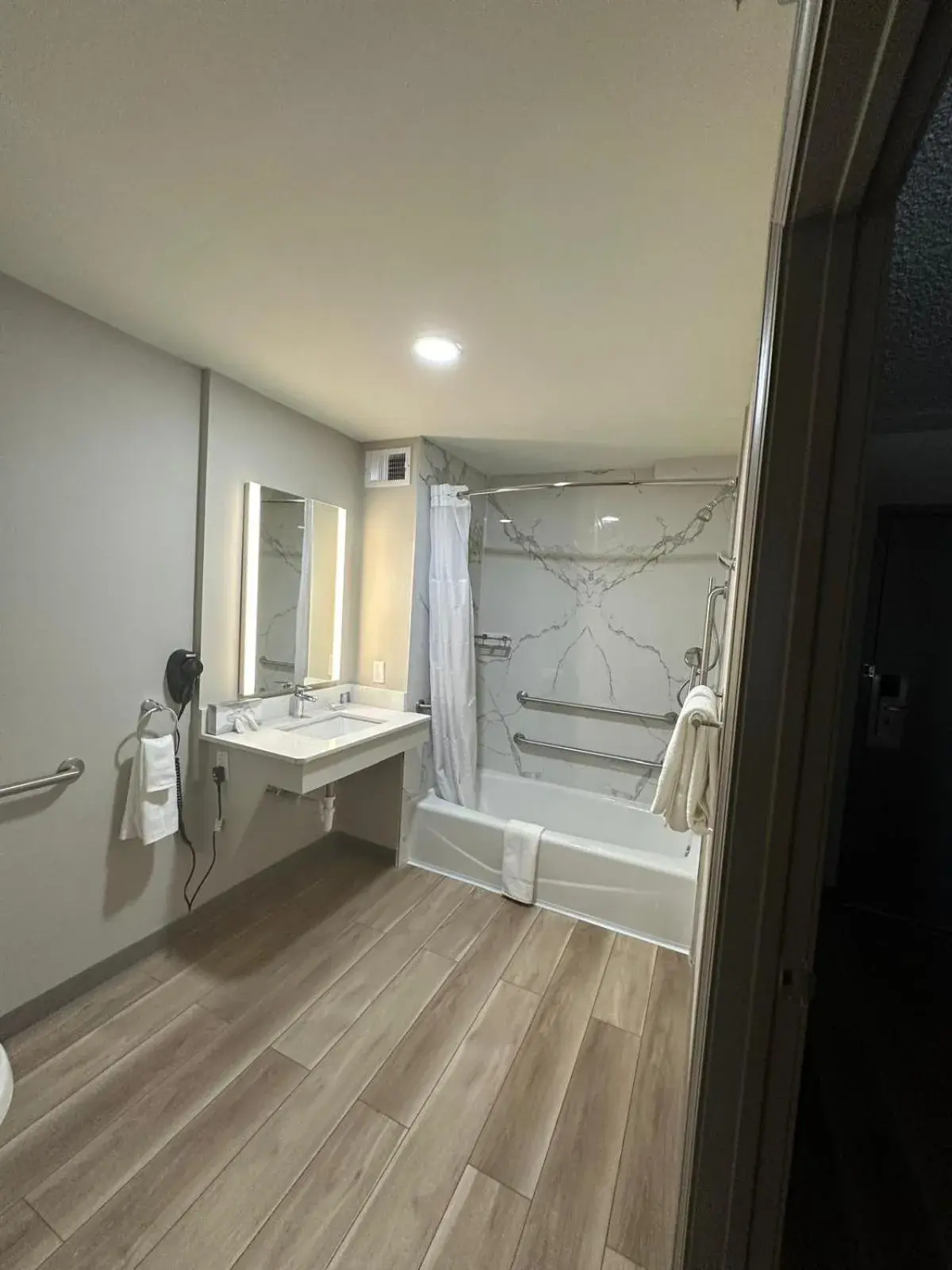 Bathroom in Days Inn by Wyndham Mandan Bismarck Area Bathroom in Days Inn by Wyndham Mandan Bismarck Area