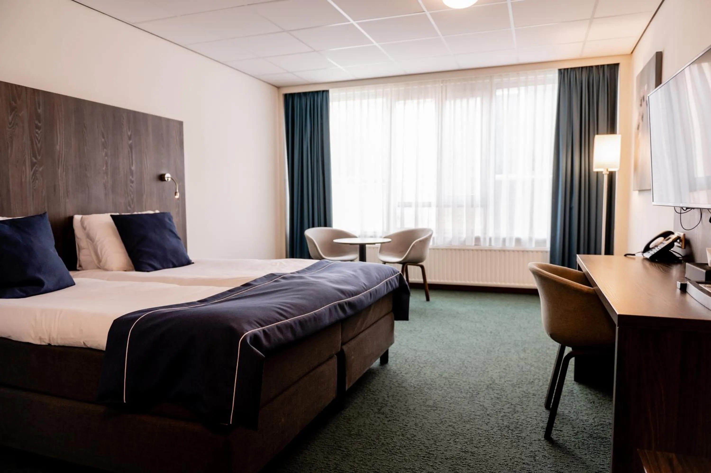 Bed in City Hotel de Jonge