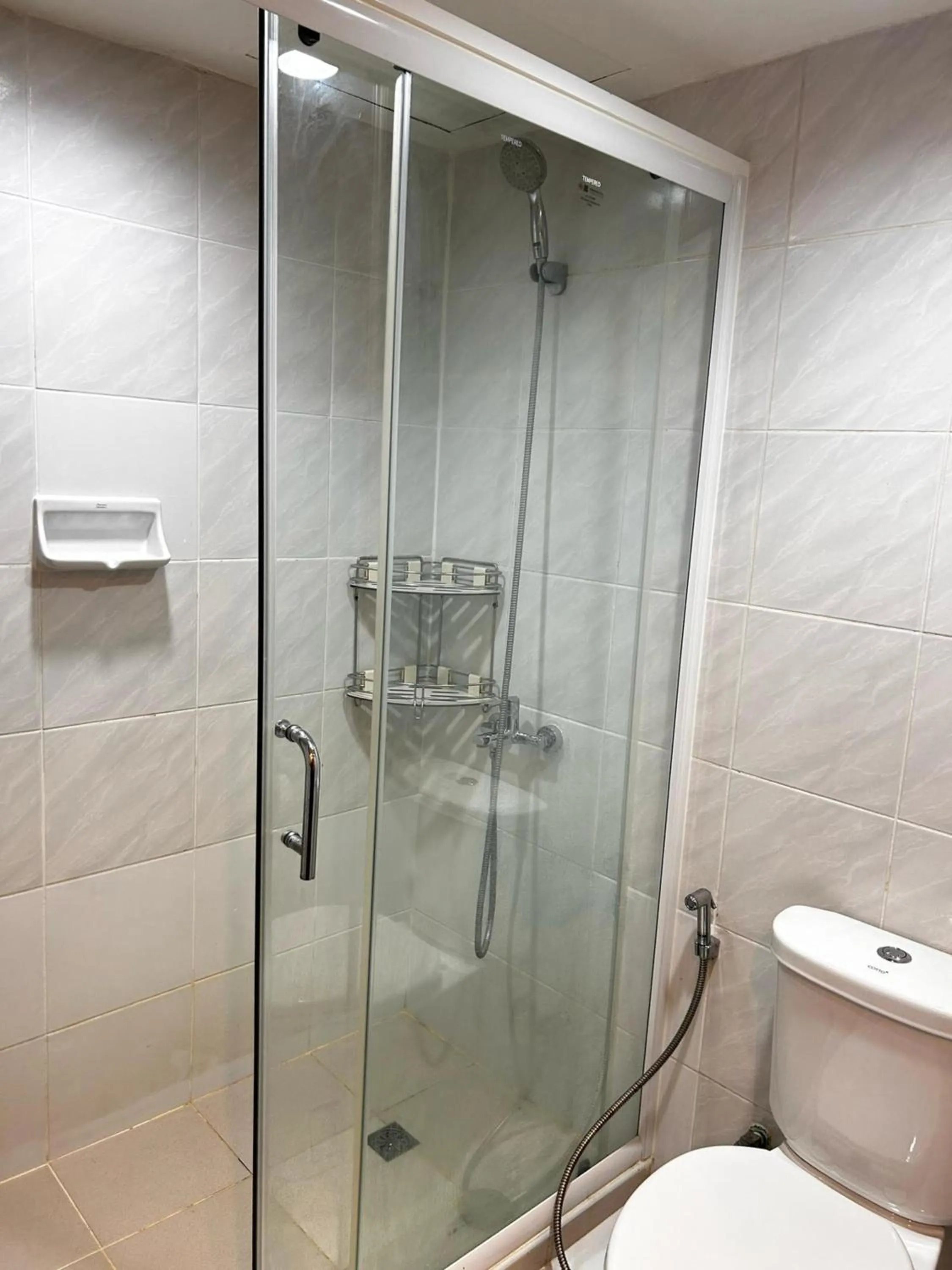 Shower in Omni Tower Sukhumvit Soi 4 Direct Rooms