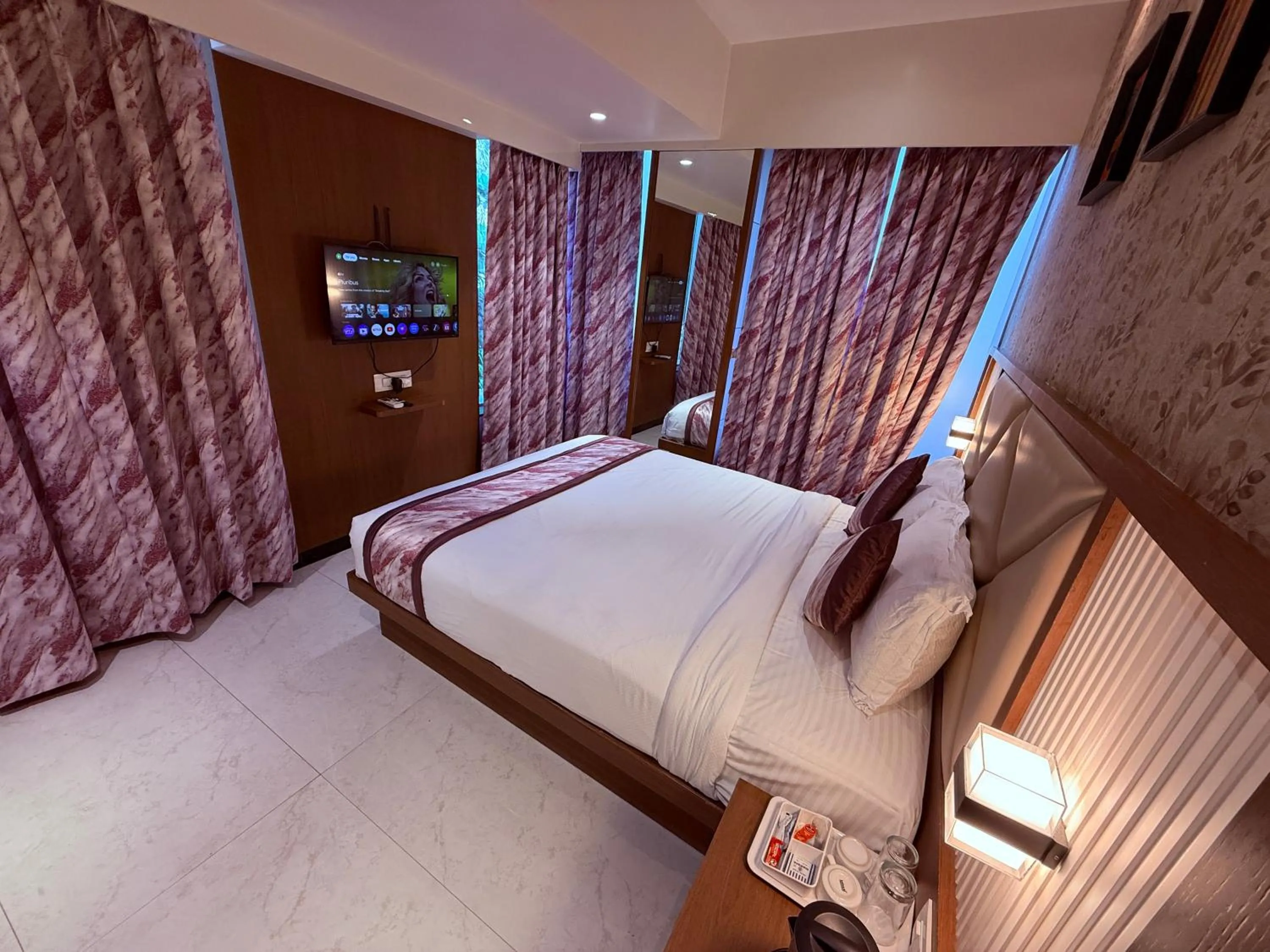 Bed in Hotel Pearl Residency Thane