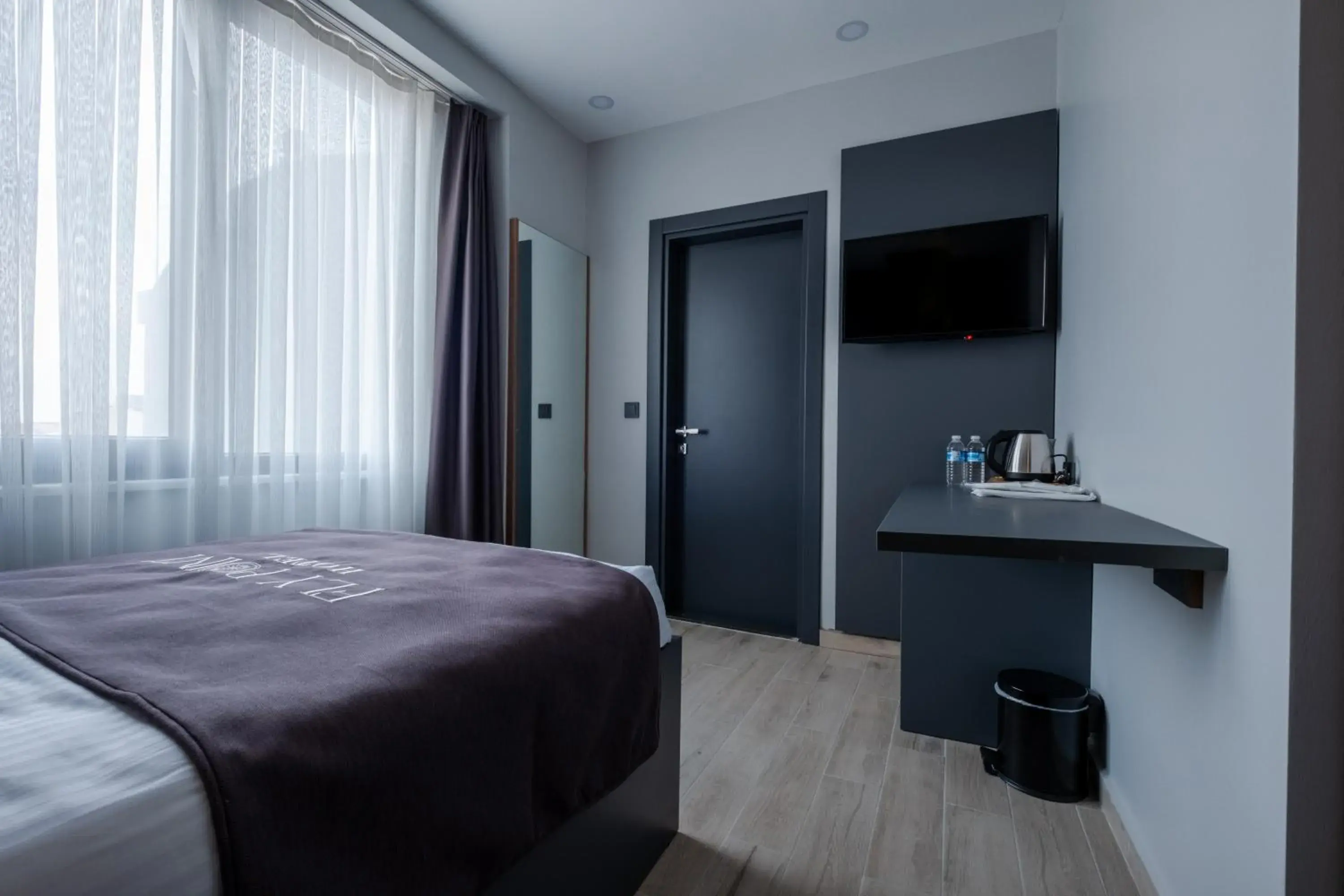 TV and multimedia, Bed in FLY POINT AIRPORT HOTEL TV and multimedia, Bed in FLY POINT AIRPORT HOTEL