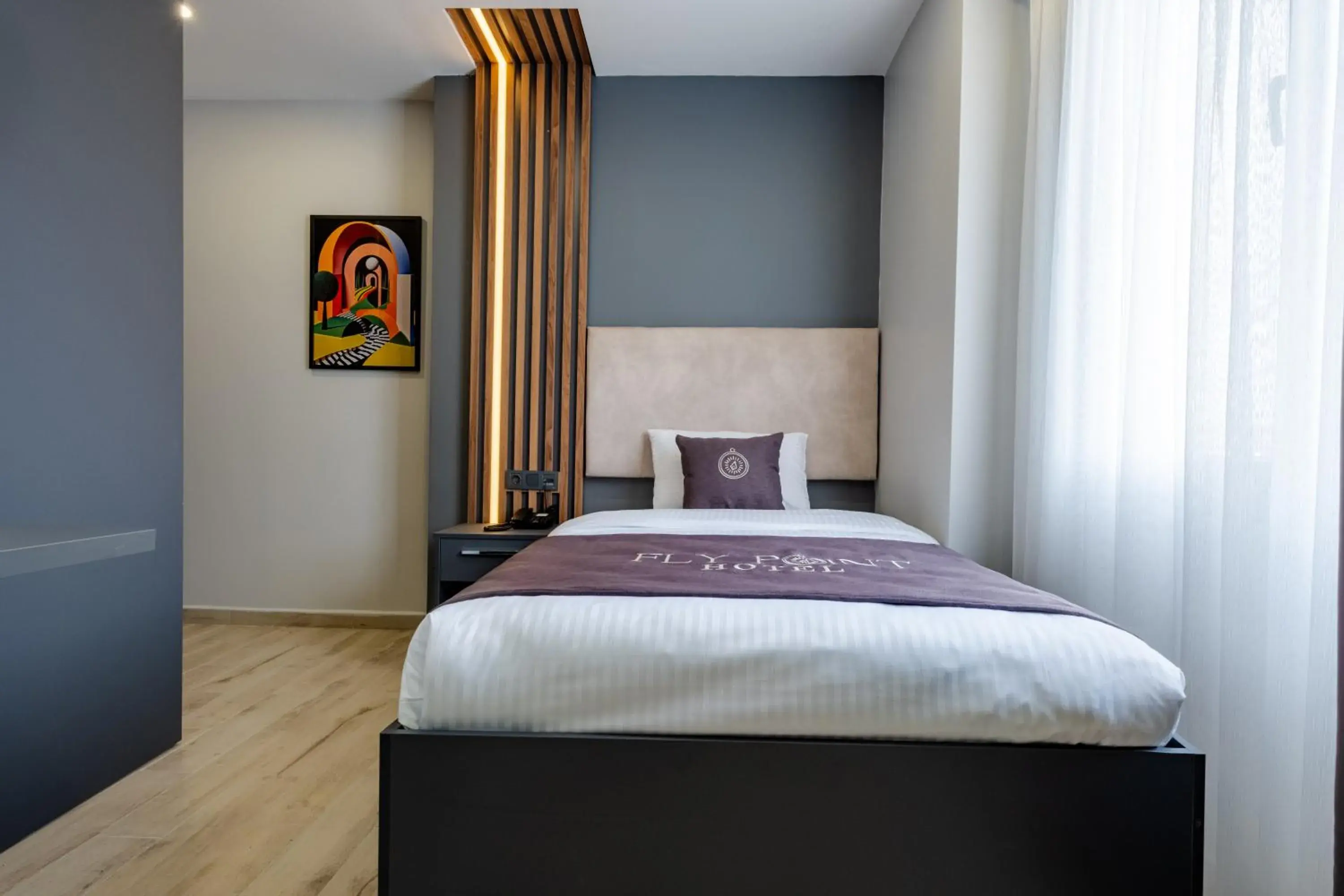 Bed in FLY POINT AIRPORT HOTEL Bed in FLY POINT AIRPORT HOTEL