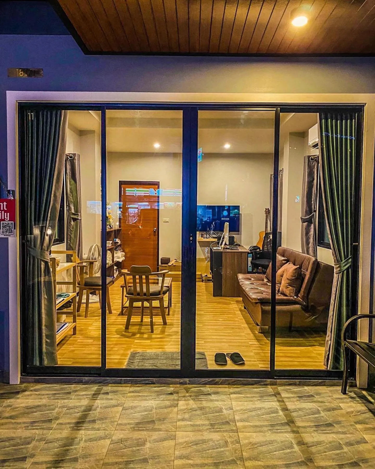 Communal lounge/ TV room in Hm House Patong