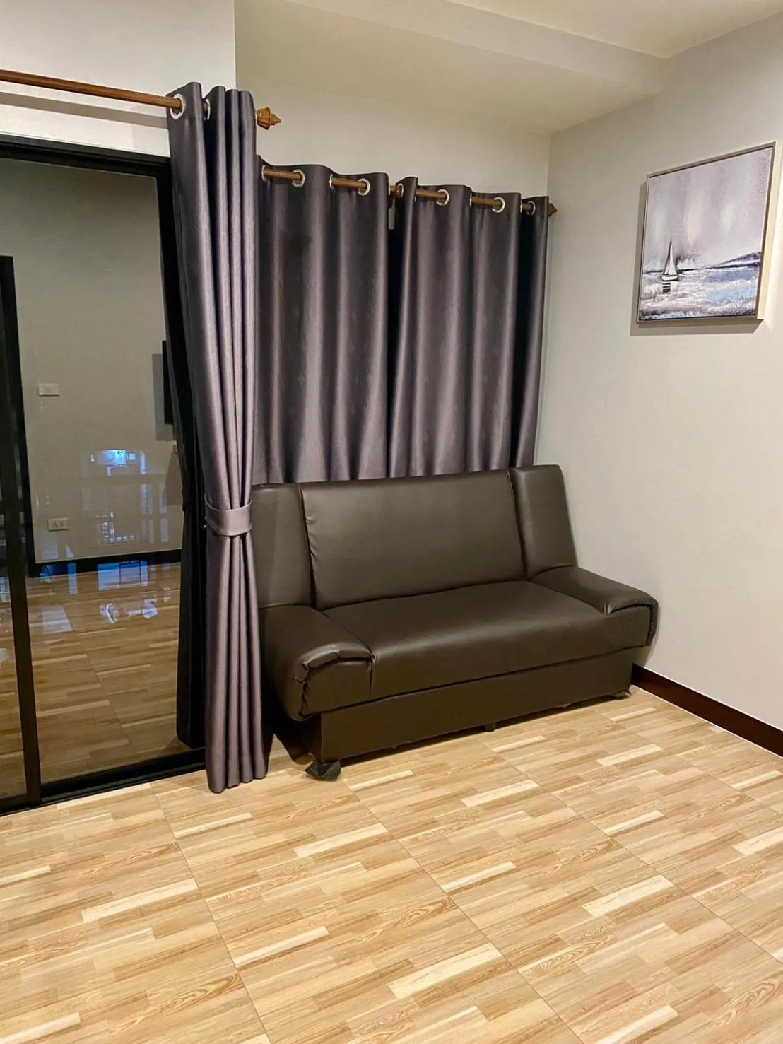Communal lounge/ TV room in Hm House Patong