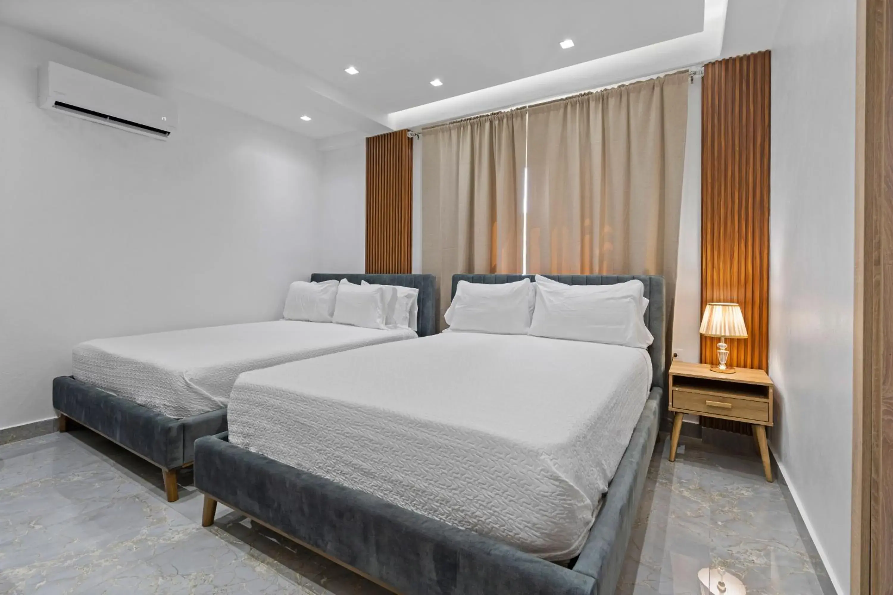 Deluxe Queen Room with Two Queen Beds in Hotel Vista Caribe Azúa Deluxe Queen Room with Two Queen Beds in Hotel Vista Caribe Azúa