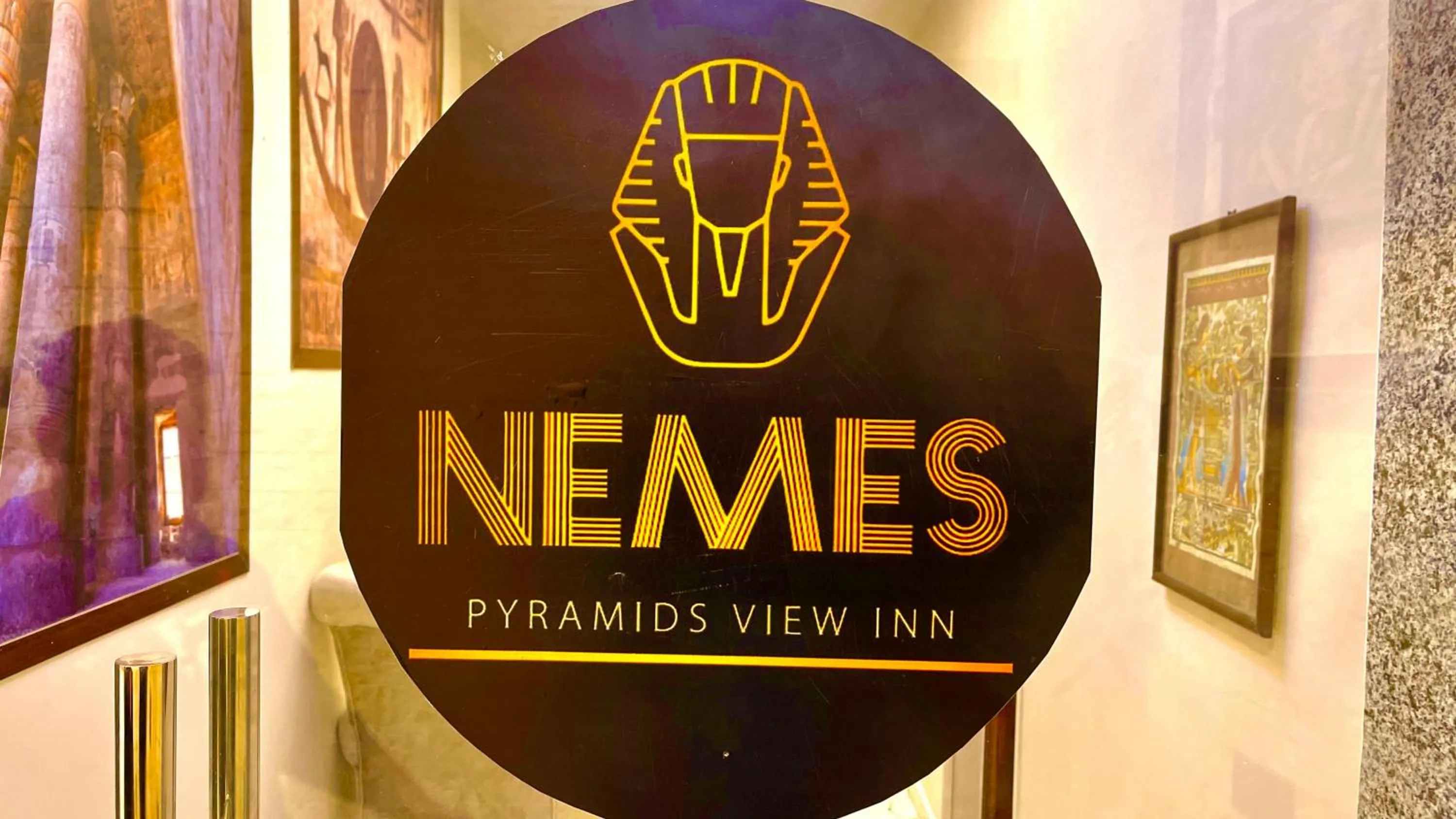 Property logo or sign in NEMES Pyramids View INN