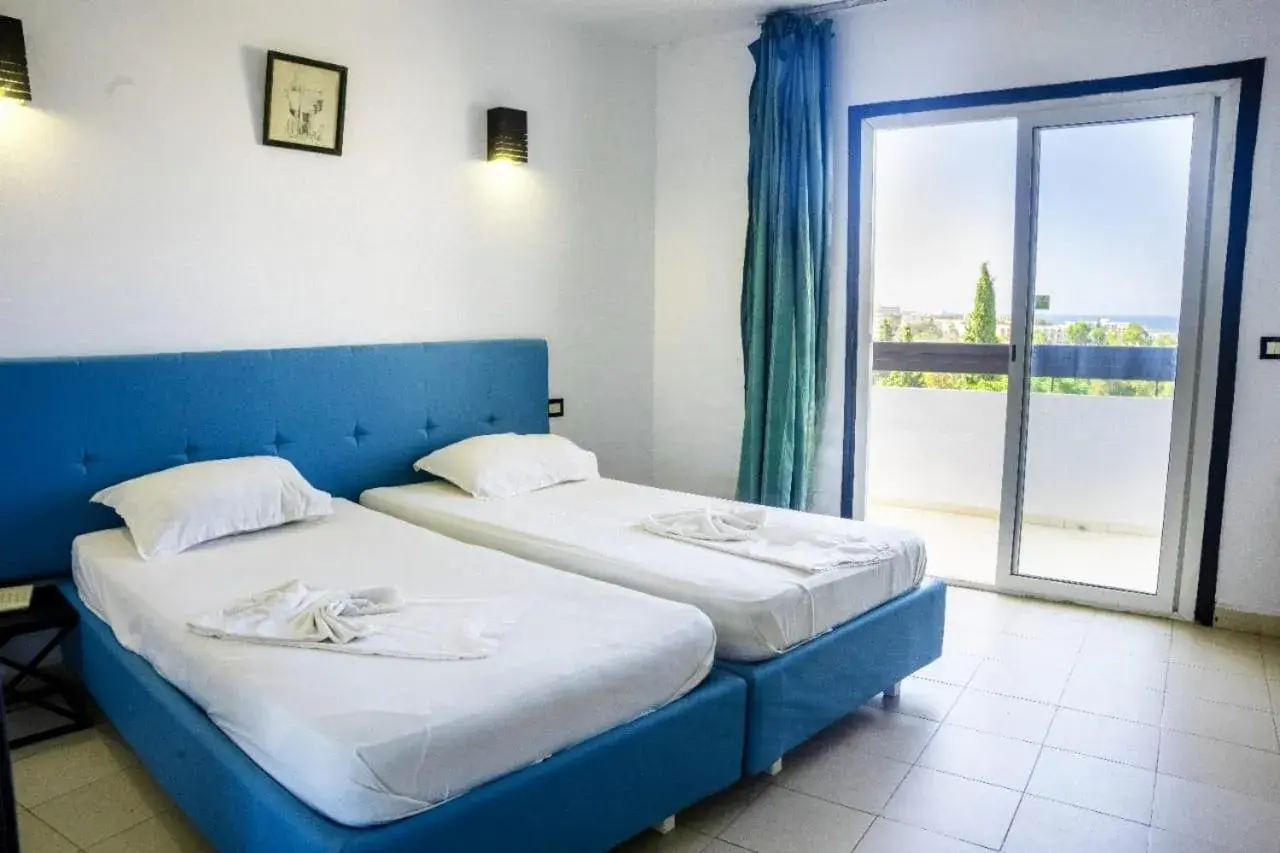 Bed in HOTEL KAISER Bed in HOTEL KAISER