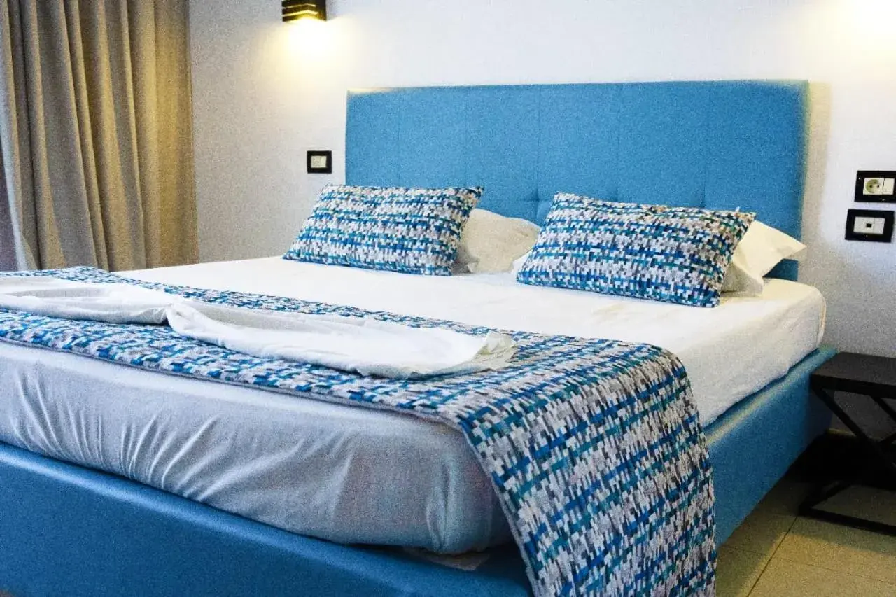 Bed in HOTEL KAISER Bed in HOTEL KAISER