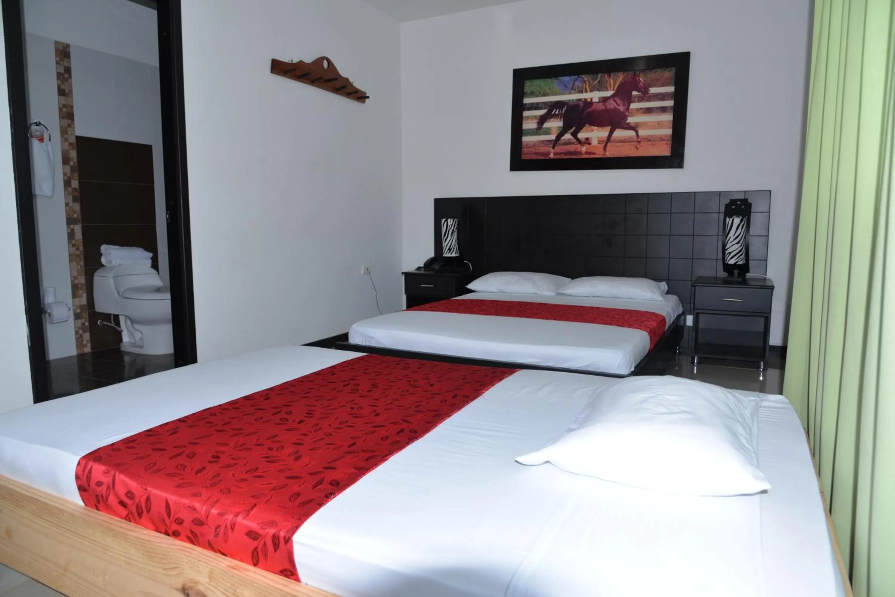 Bedroom in Hotel El Jardín Cafetero Armenia