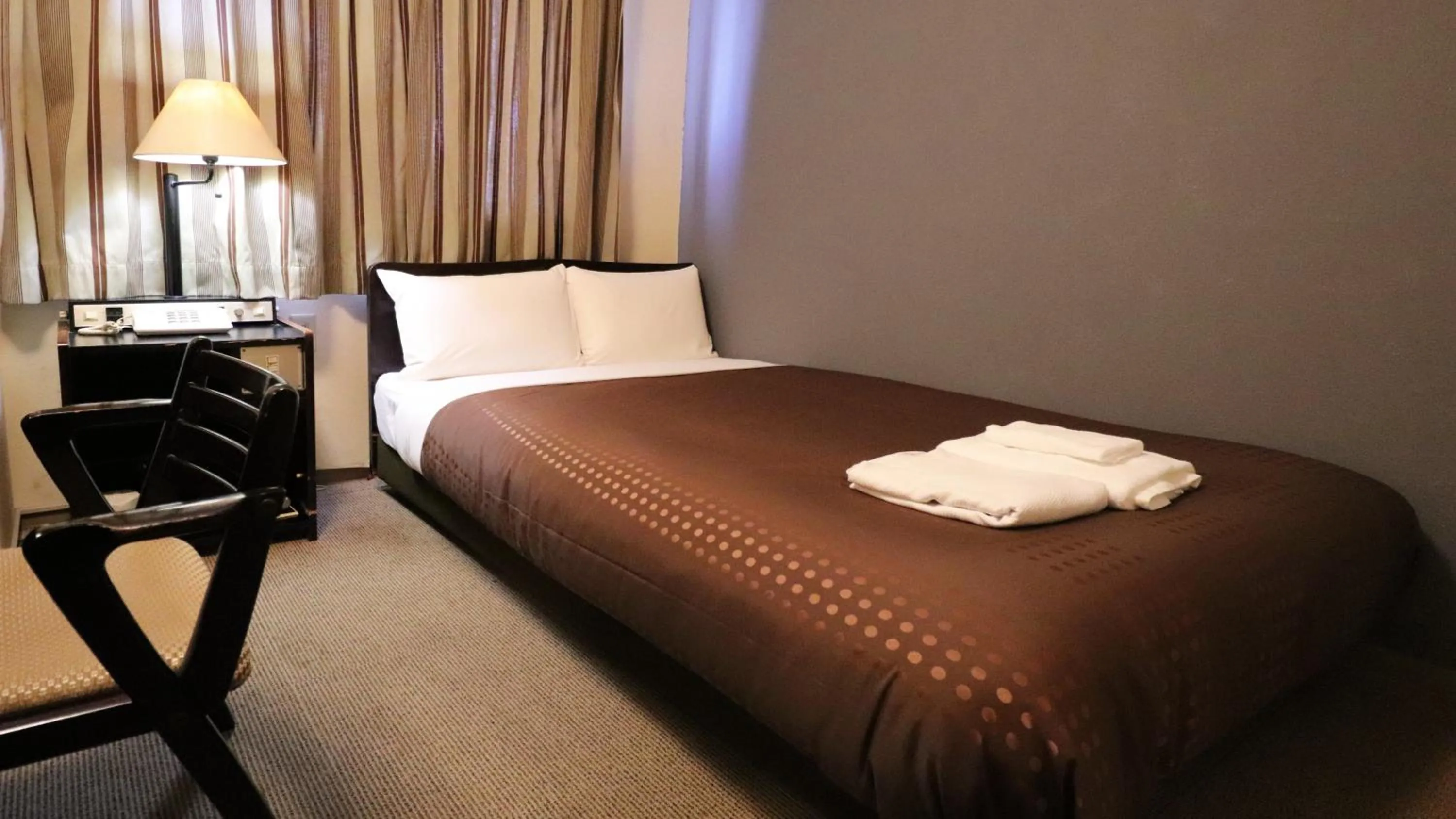 Bed in HOTEL FRONTIER YONAGO (ホテルフロンティア米子)