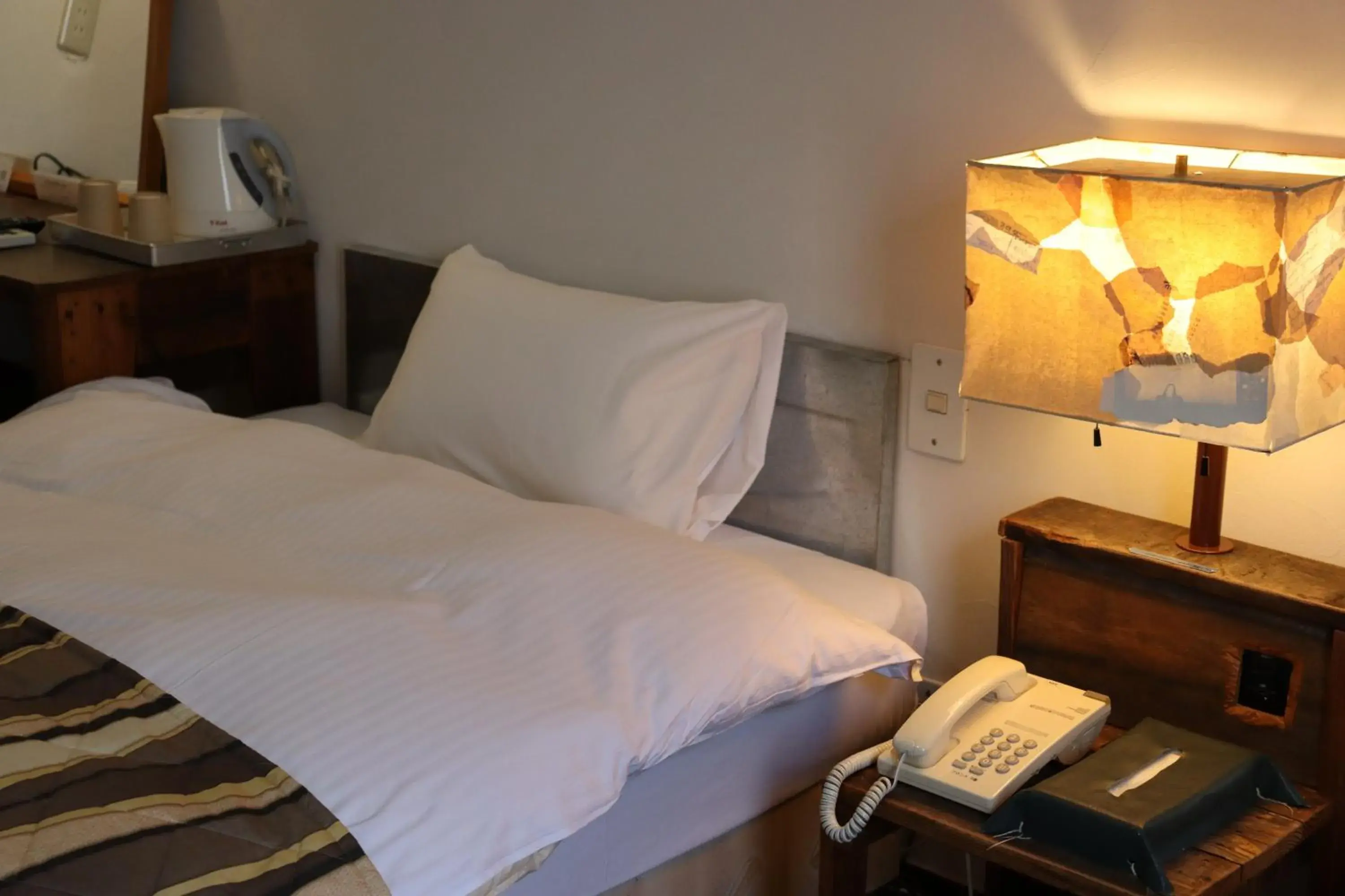 Bed in KULABO Taishokan Bed in KULABO Taishokan