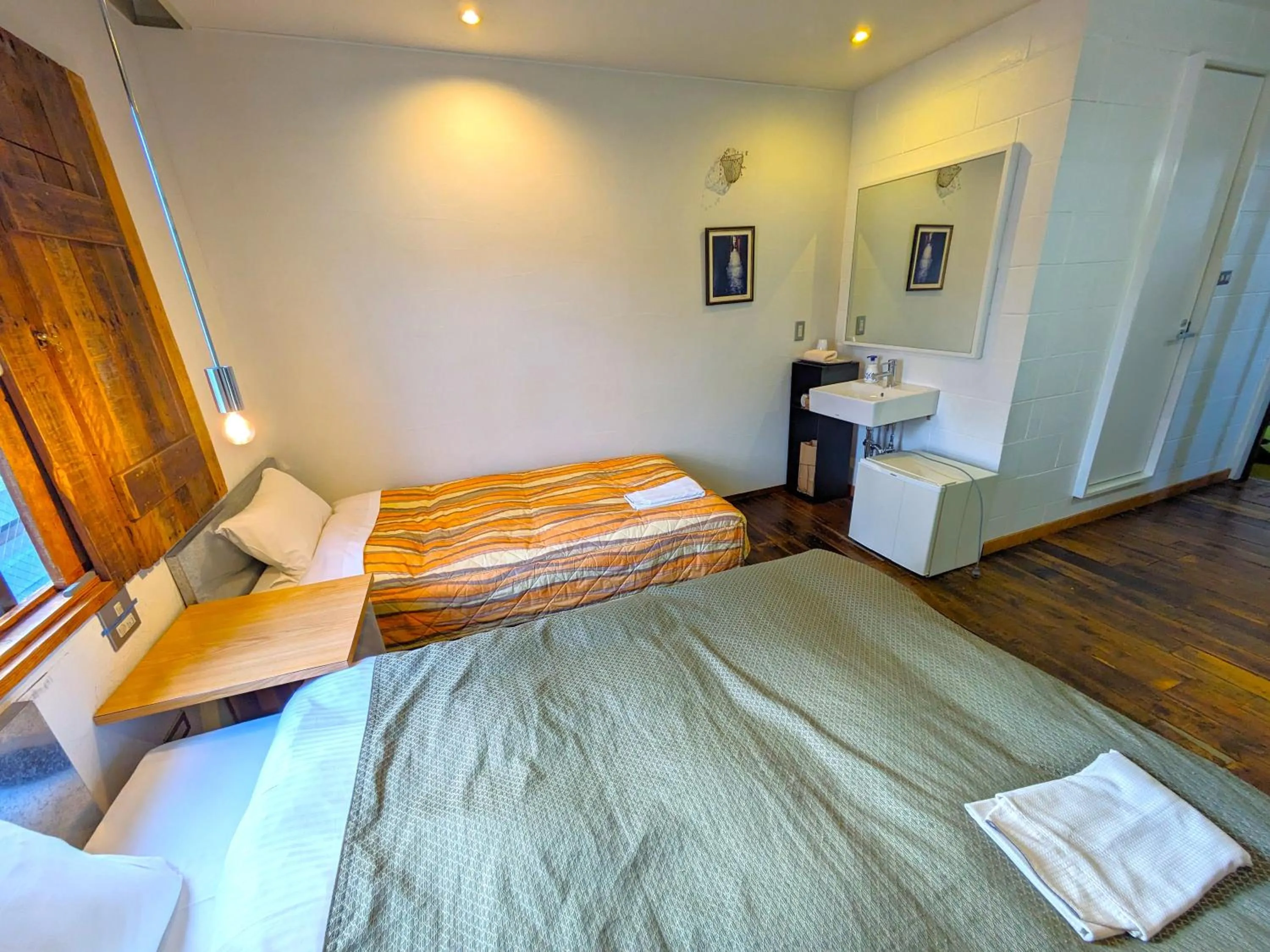 Bed in KULABO Taishokan