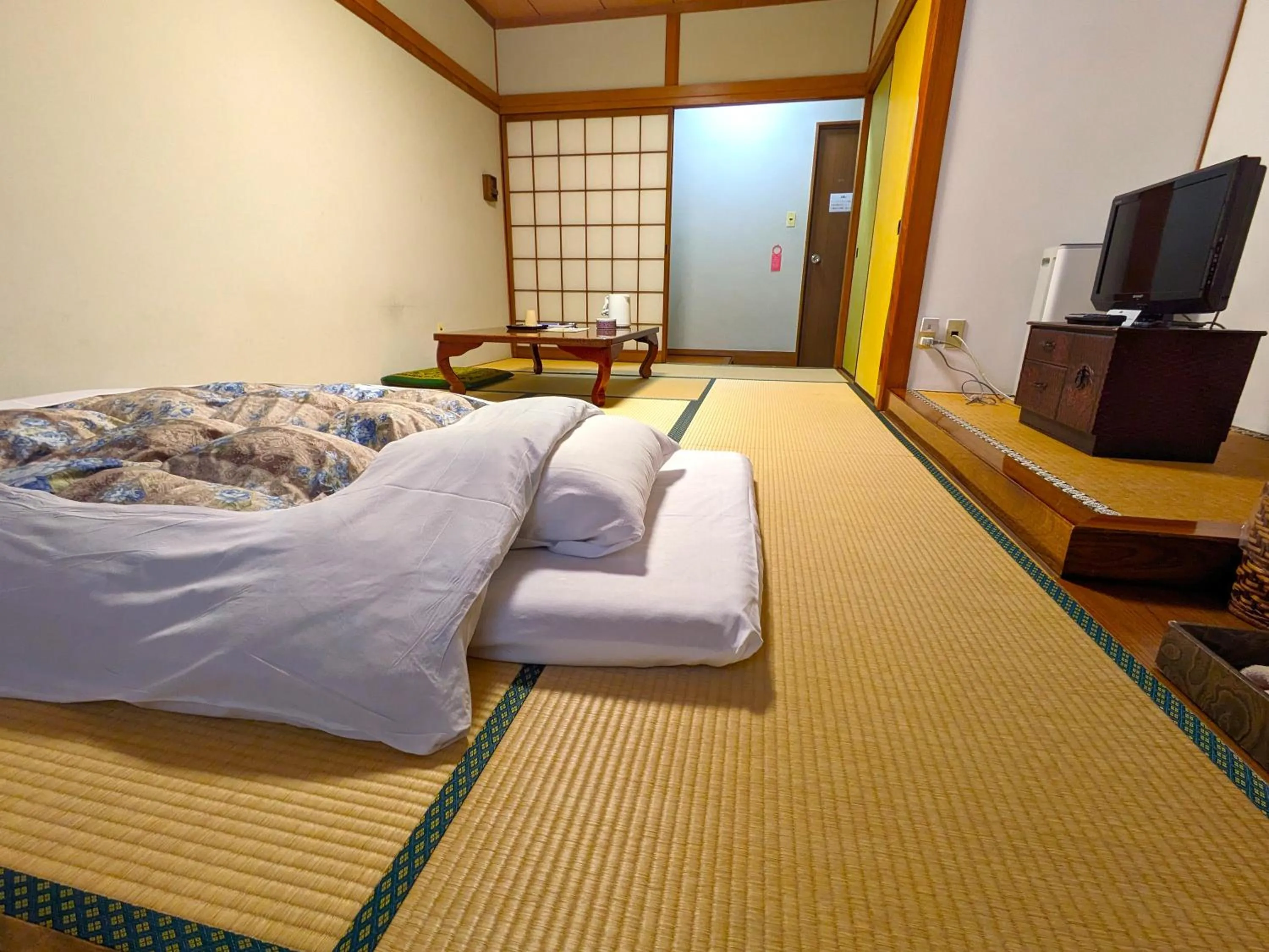 Bed in KULABO Taishokan
