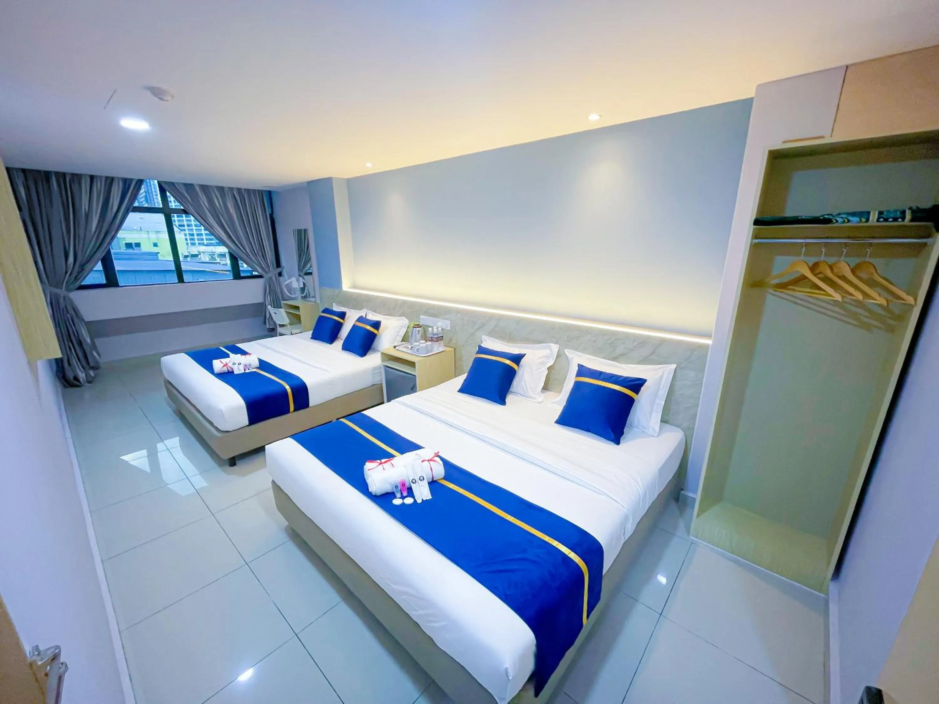 Bed in StarQ Hotel Kuala Lumpur