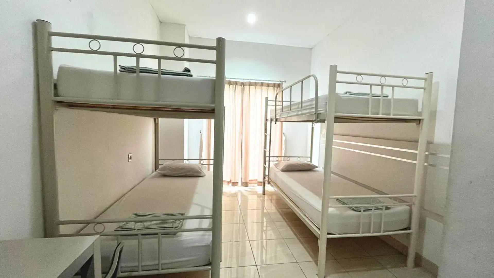 4-Bed Mixed Dormitory Room in TOS Hotel & Convention Center Tangerang Powered by Archipelago 4-Bed Mixed Dormitory Room in TOS Hotel & Convention Center Tangerang Powered by Archipelago
