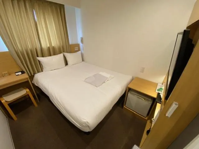 Bed in Rembrandt inn Aomori