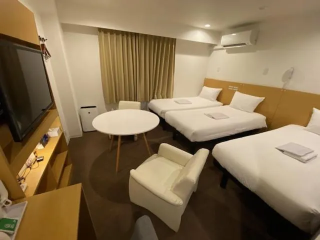 Bed in Rembrandt inn Aomori