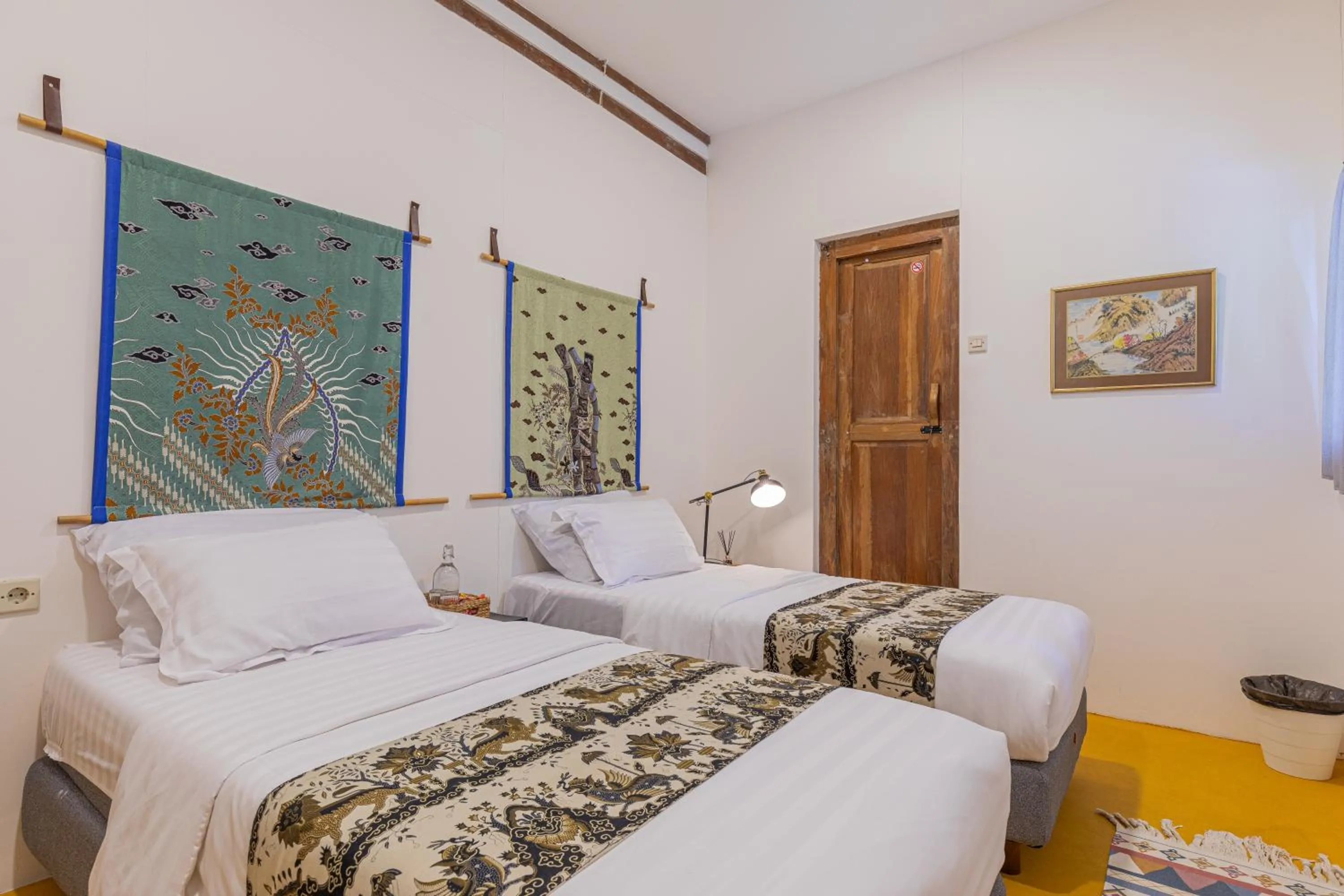 Bed in Yukke Tembi Homestay