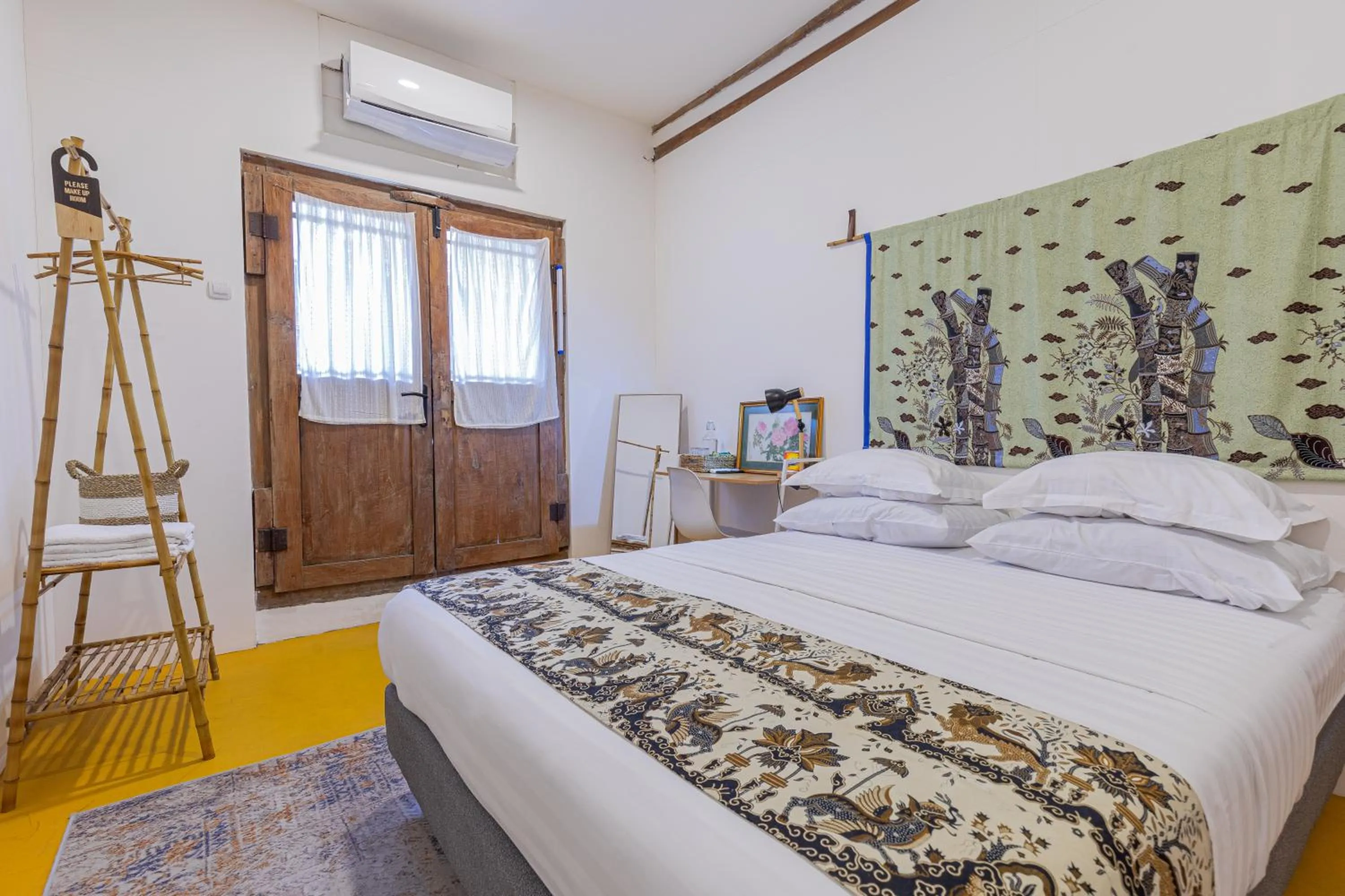 Bed in Yukke Tembi Homestay