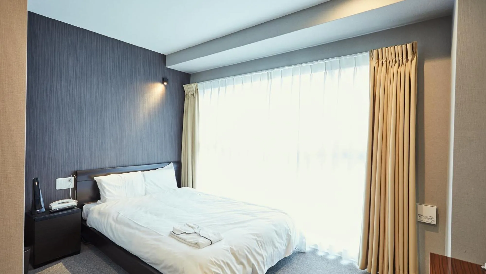 Photo of the whole room, Bed in EZ HOTEL Kansai Airport Seaside