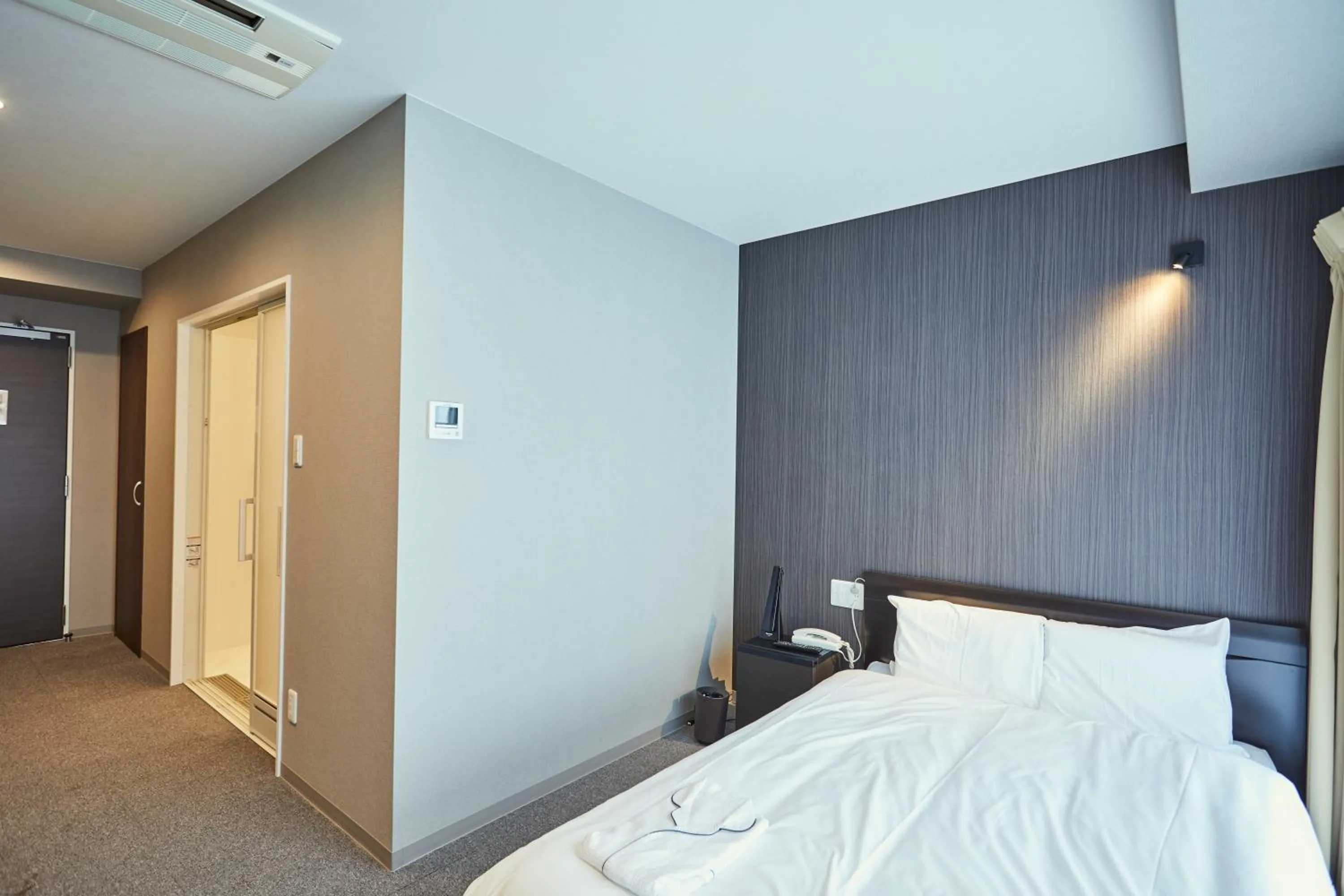 Photo of the whole room, Bed in EZ HOTEL Kansai Airport Seaside