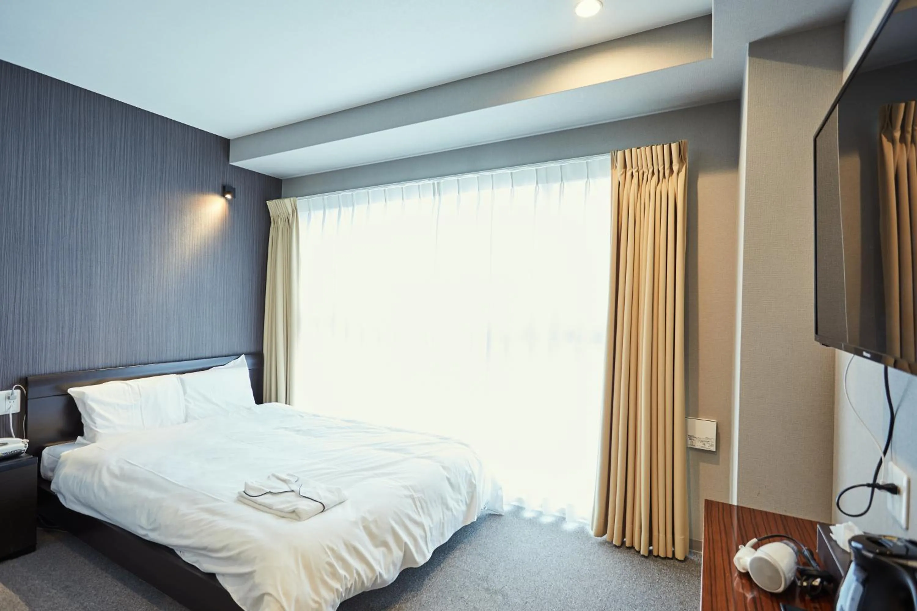 Photo of the whole room, Bed in EZ HOTEL Kansai Airport Seaside