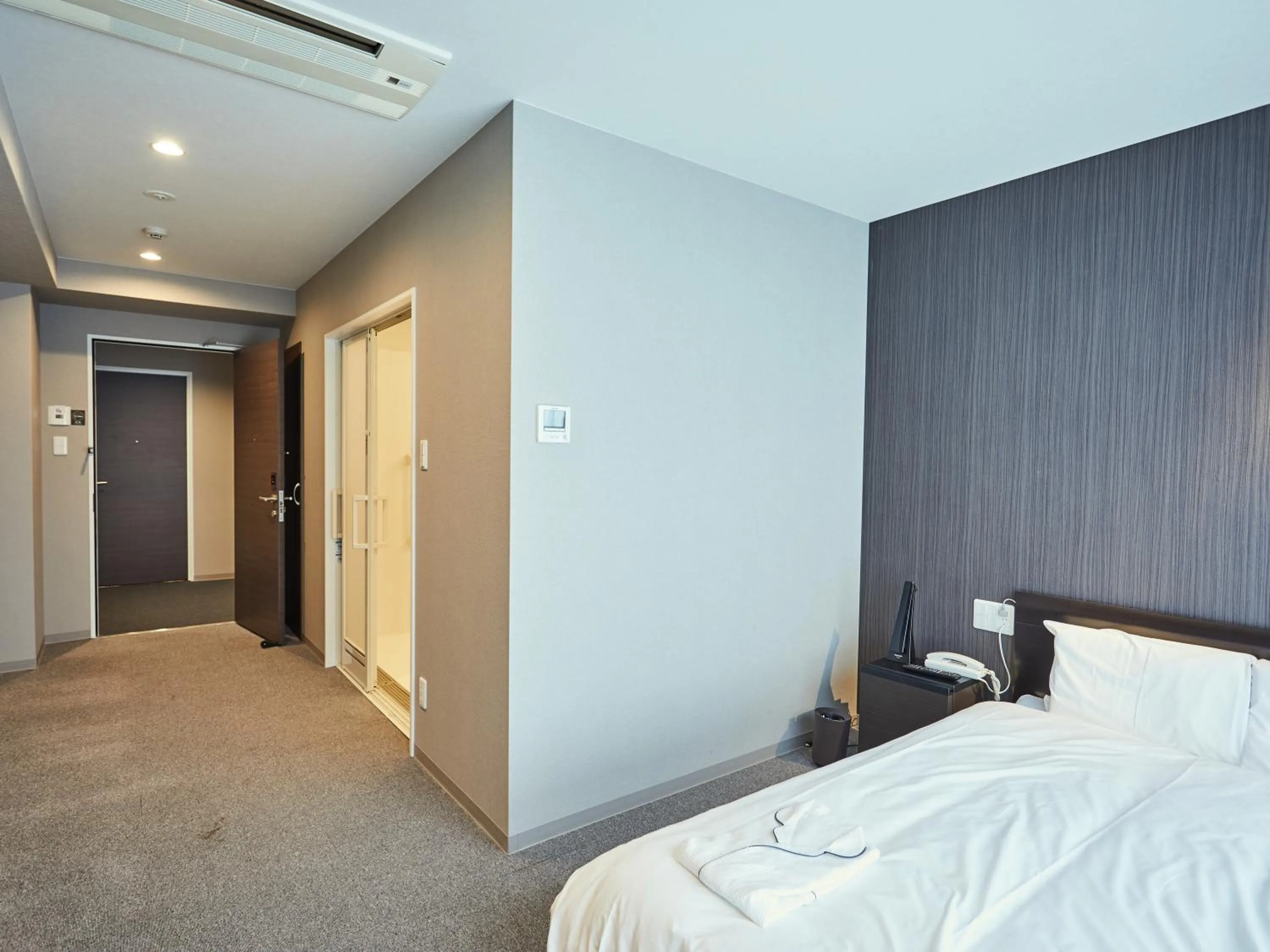 Photo of the whole room, Bed in EZ HOTEL Kansai Airport Seaside