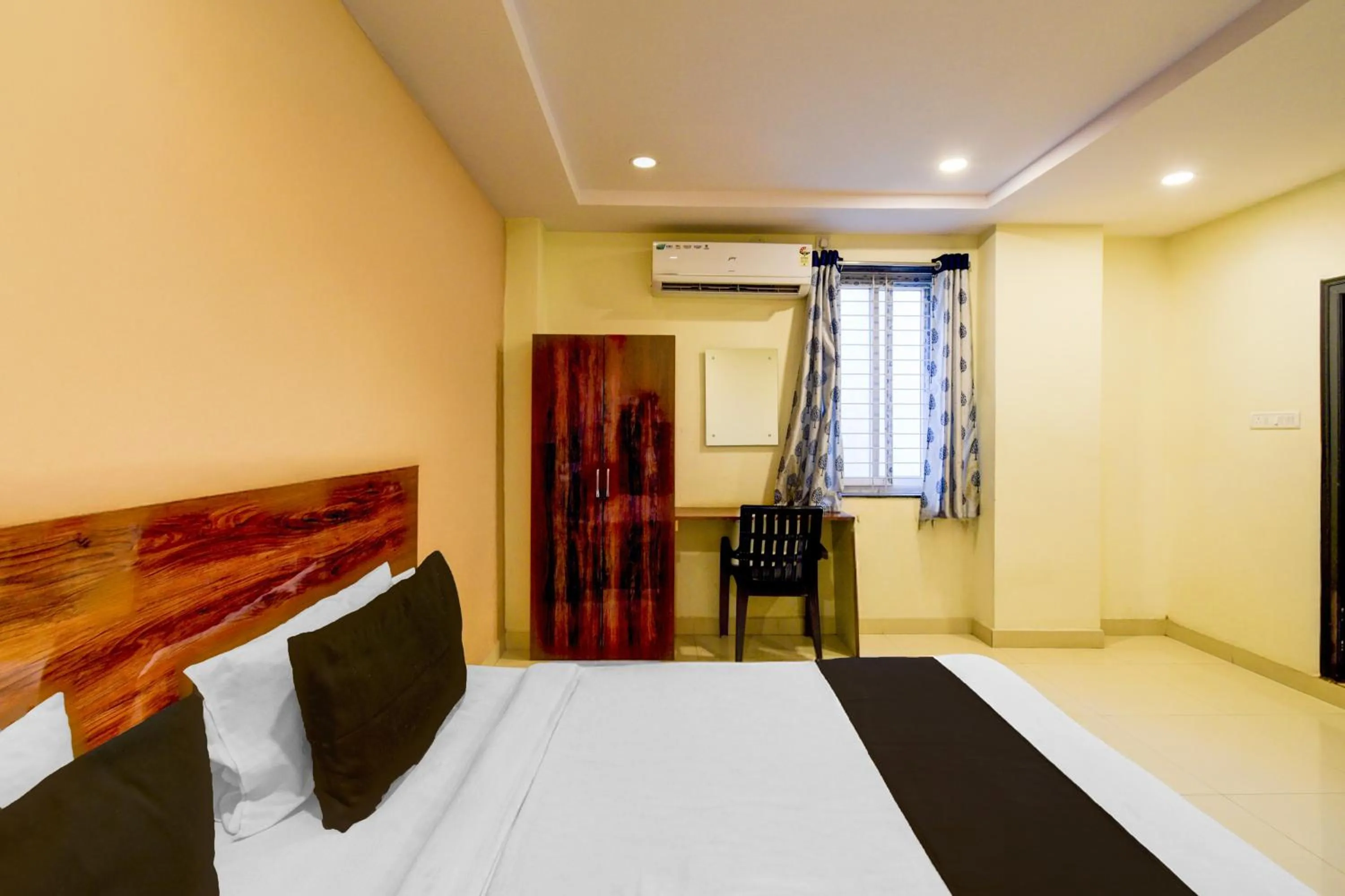 Bedroom, Bed in Hotel O AMR Planet Mall Hyderabad Formerly R Square