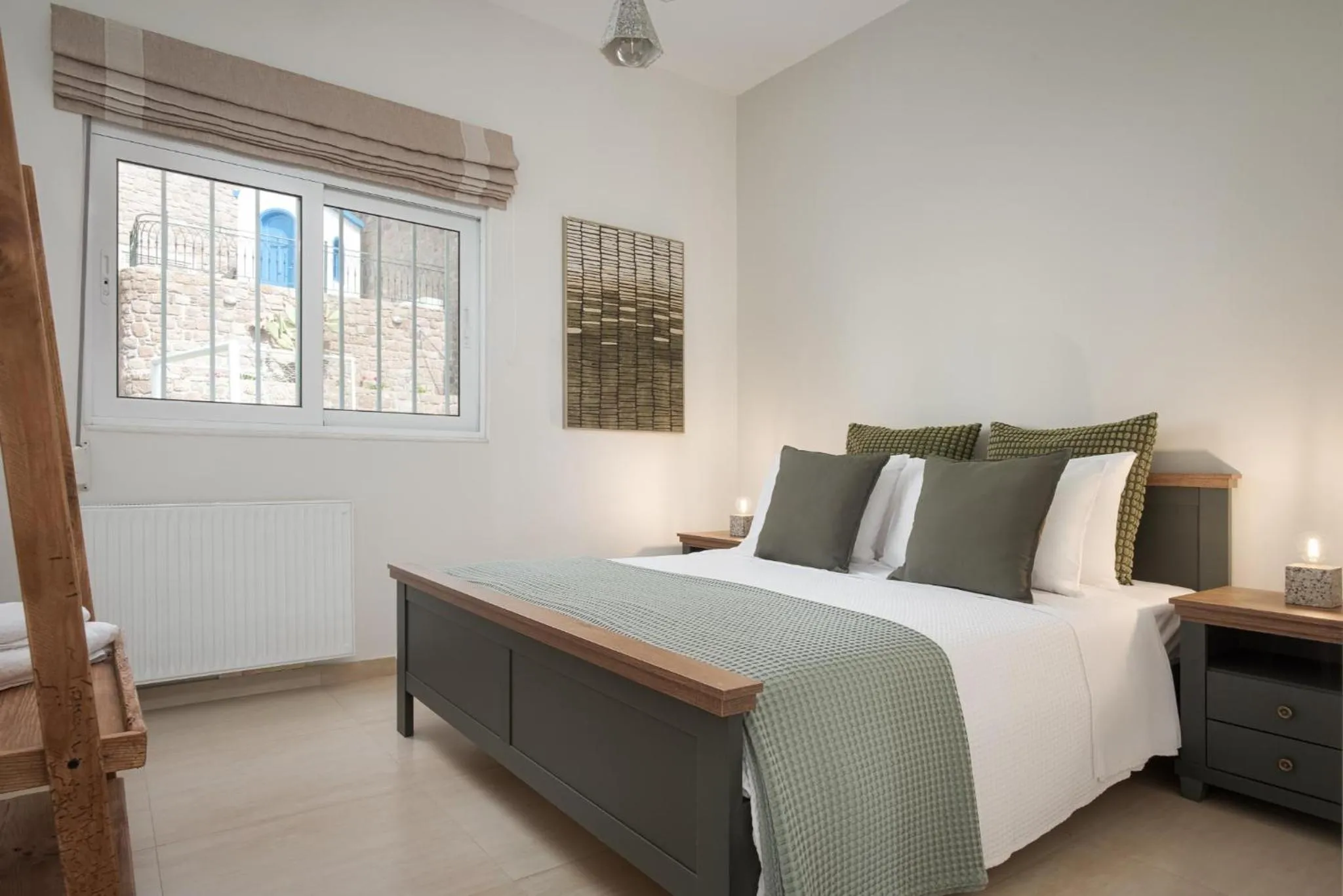 Bed in Kaerati Villa Aegina