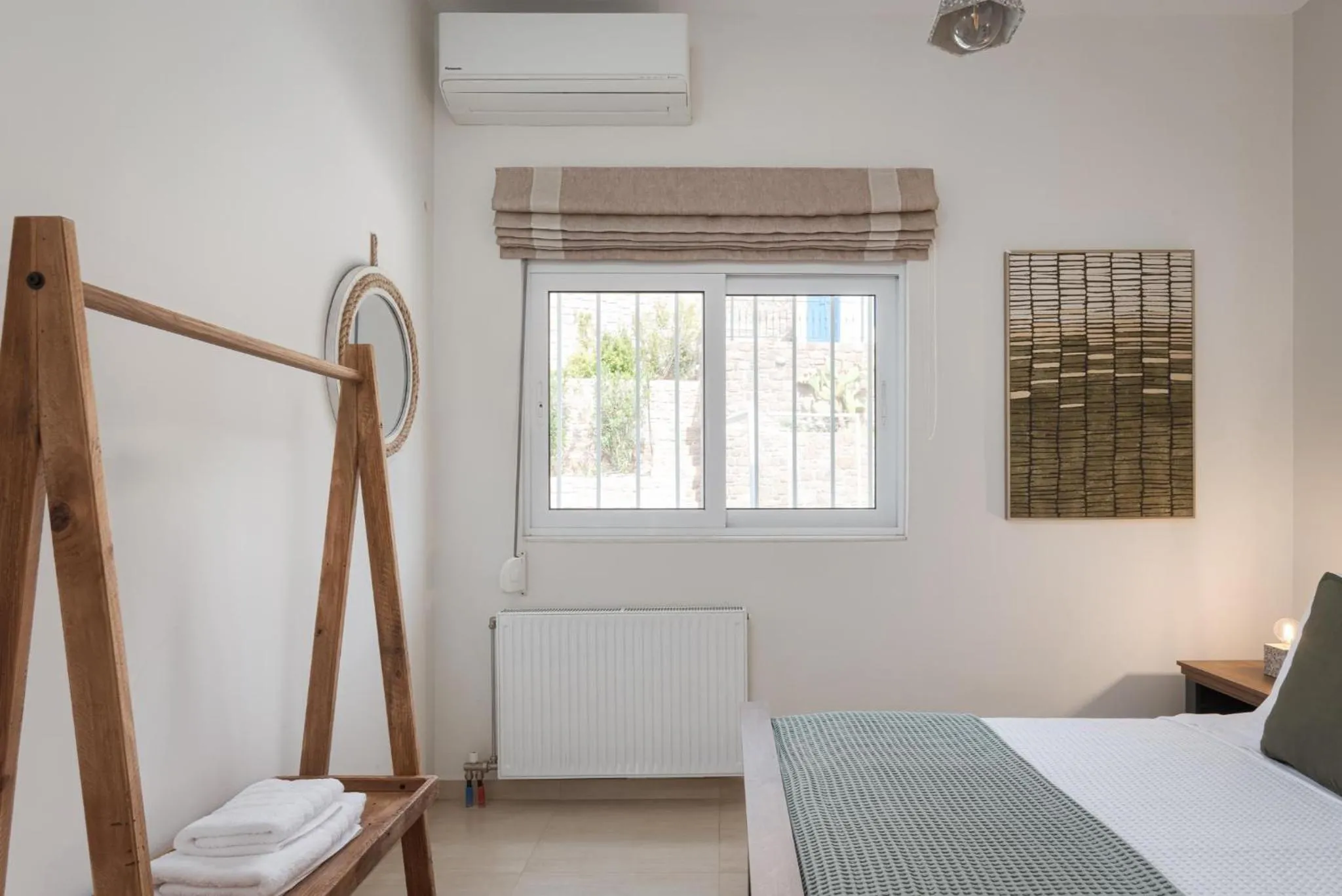 Bed in Kaerati Villa Aegina