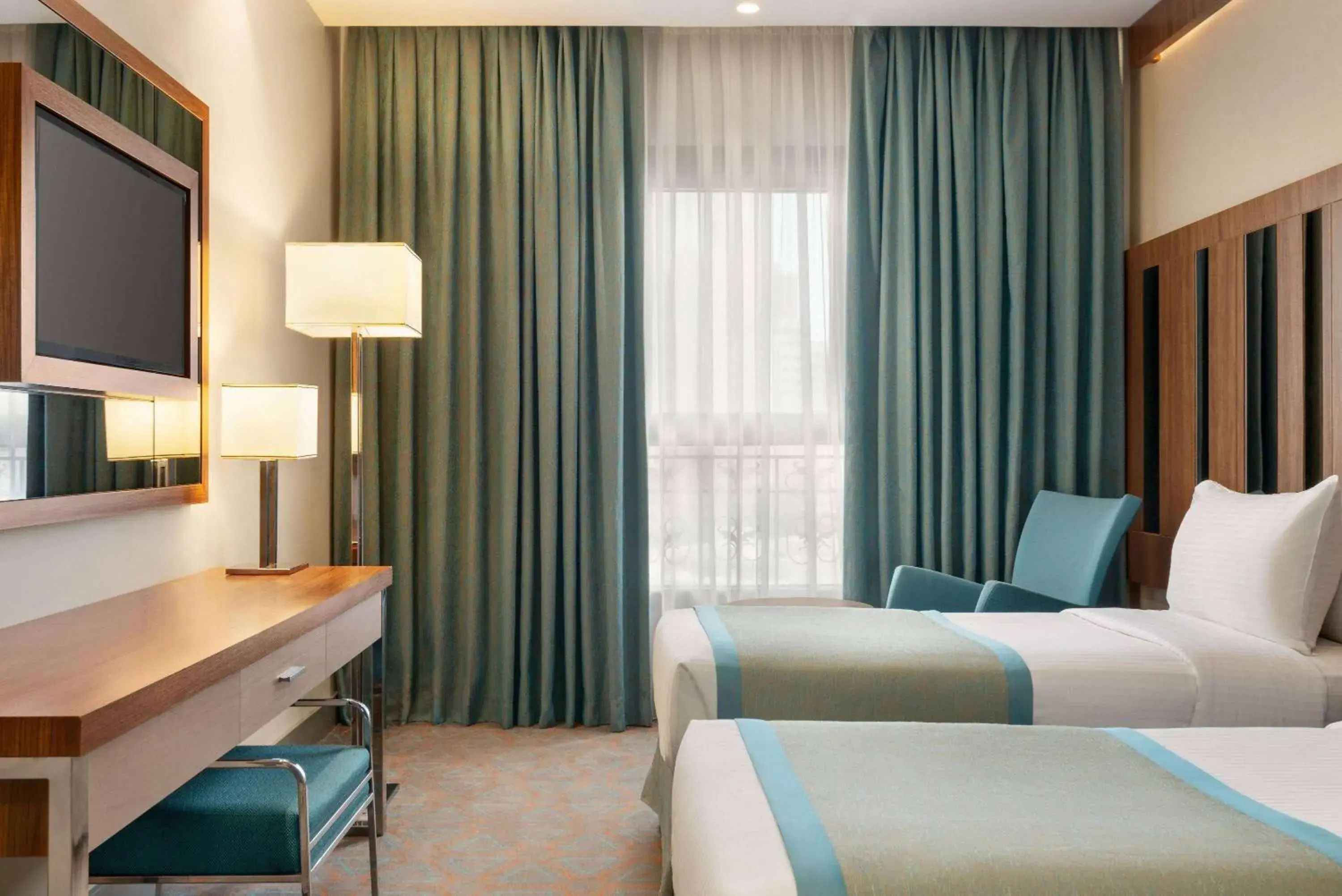 Photo of the whole room, Bed in Ramada by Wyndham Makkah Zad Al Tayseer Photo of the whole room, Bed in Ramada by Wyndham Makkah Zad Al Tayseer