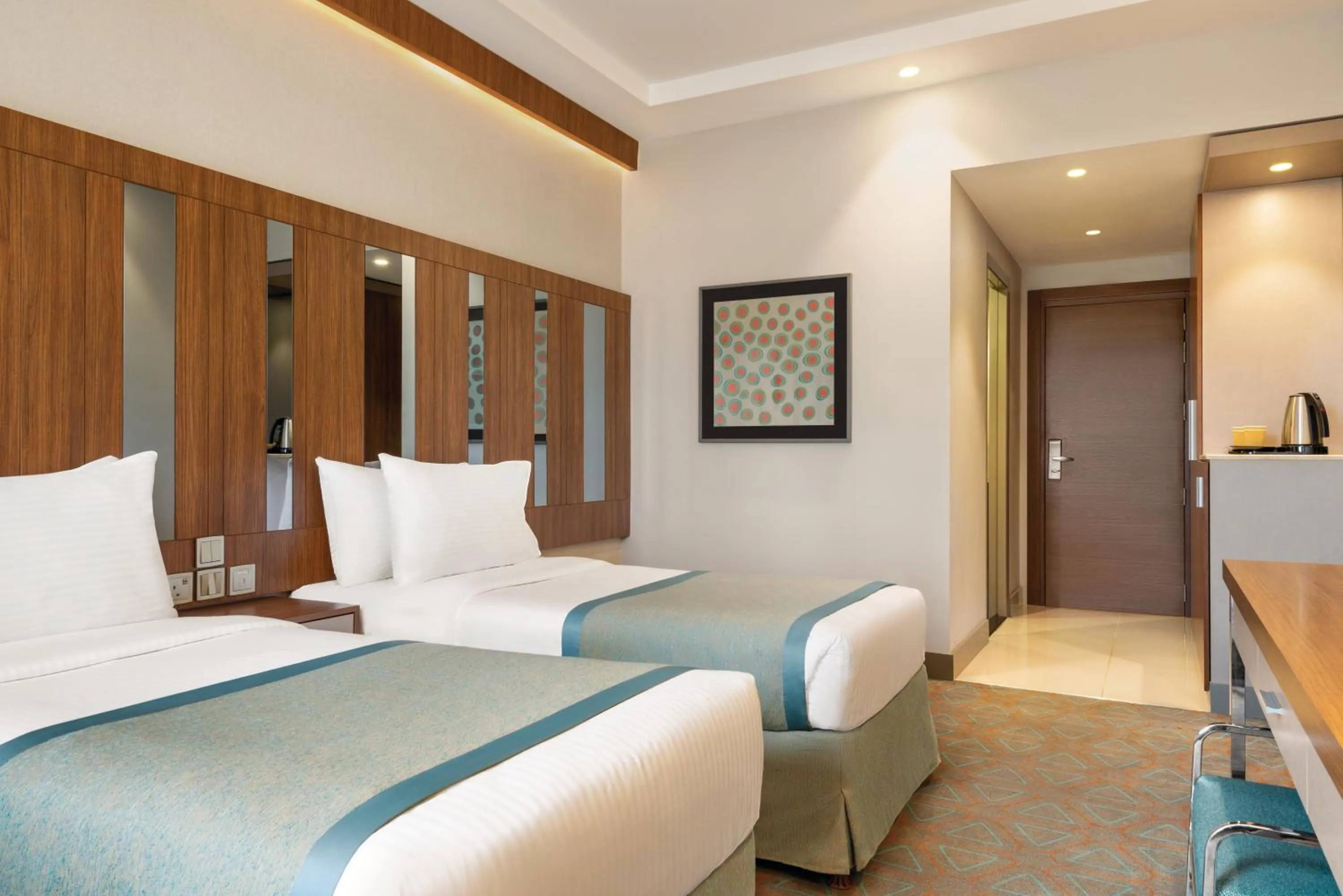 Bed in Ramada by Wyndham Makkah Zad Al Tayseer