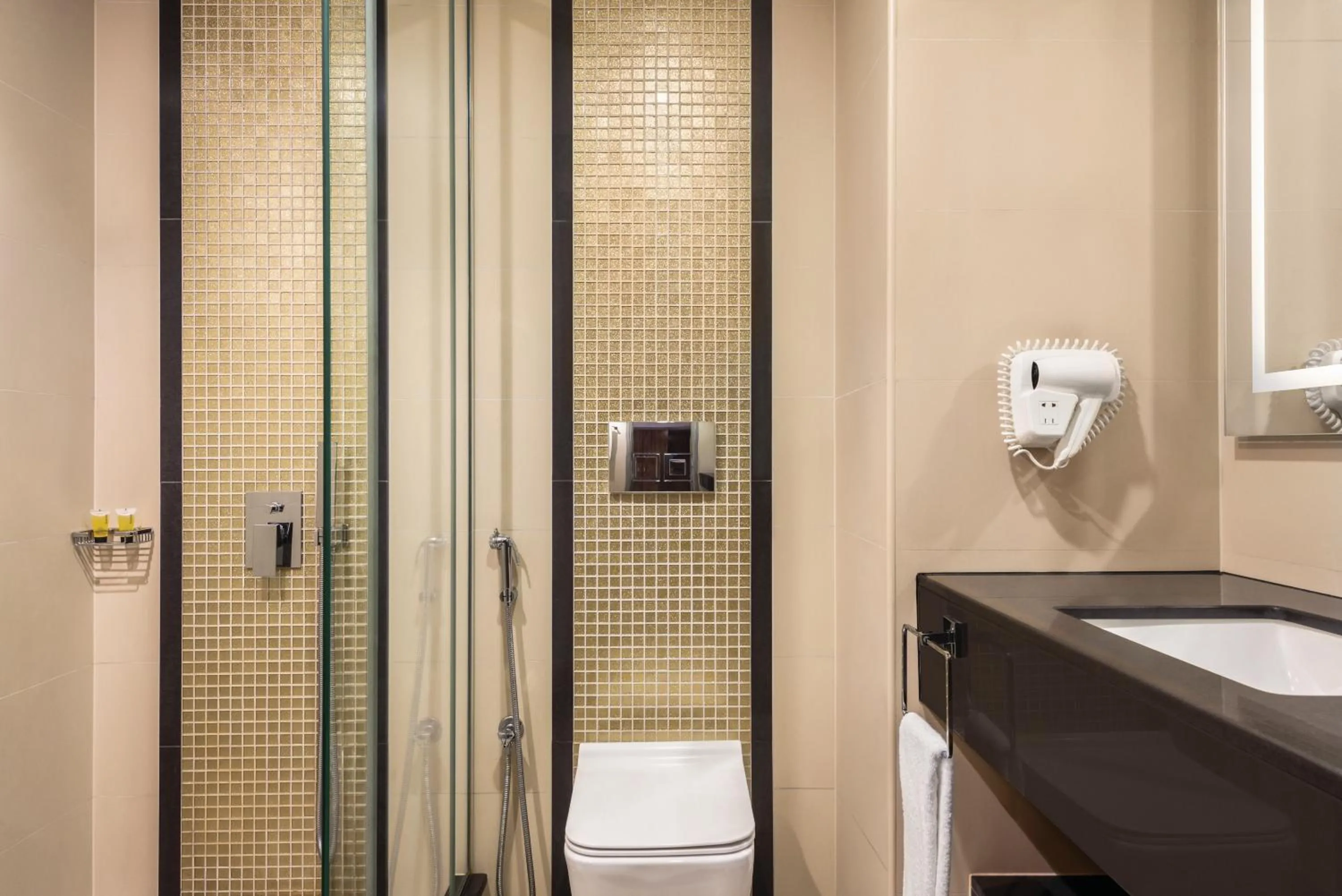 Shower in Ramada by Wyndham Makkah Zad Al Tayseer