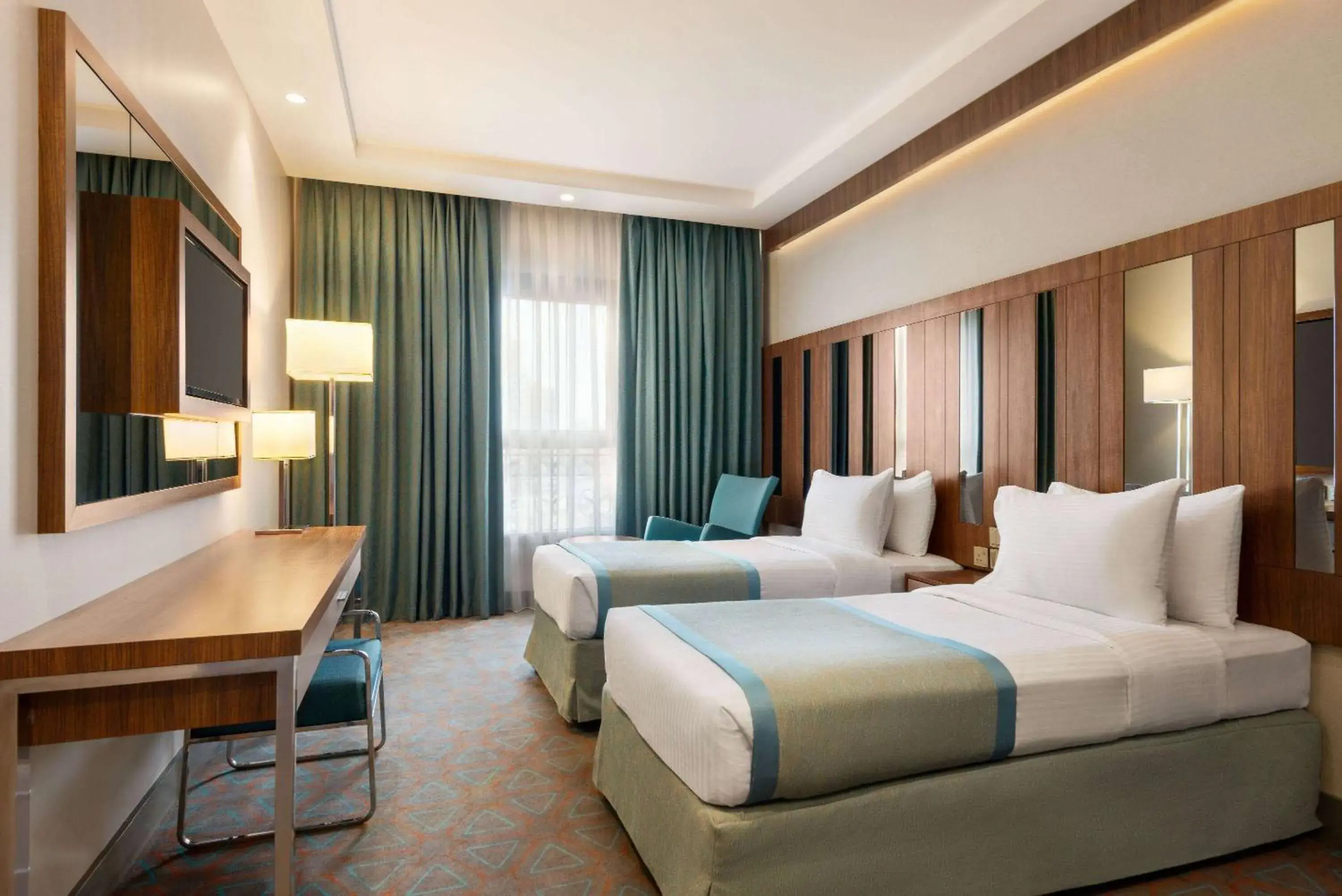 Photo of the whole room, Bed in Ramada by Wyndham Makkah Zad Al Tayseer Photo of the whole room, Bed in Ramada by Wyndham Makkah Zad Al Tayseer