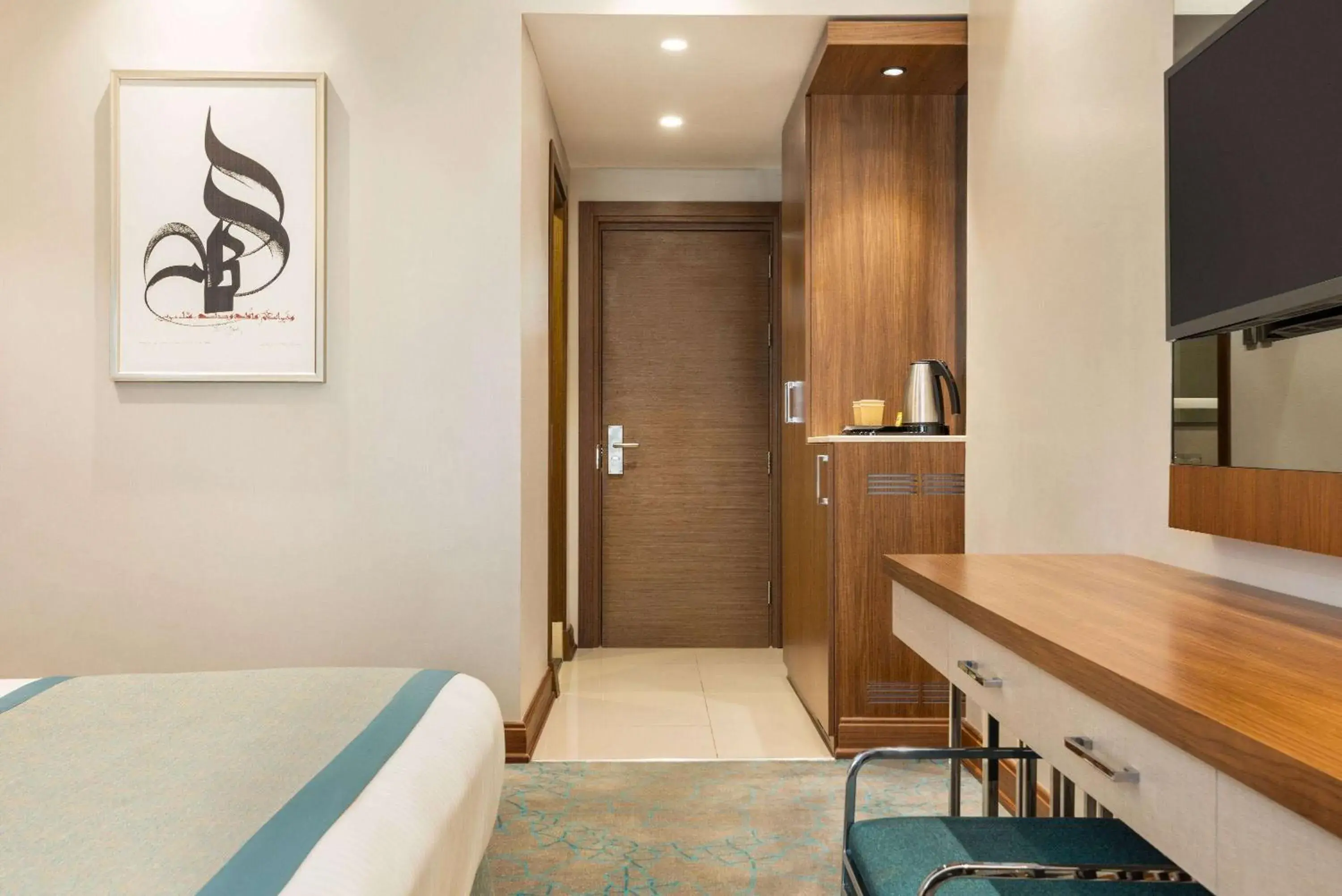 Coffee/tea facilities, Bed in Ramada by Wyndham Makkah Zad Al Rawda Coffee/tea facilities, Bed in Ramada by Wyndham Makkah Zad Al Rawda