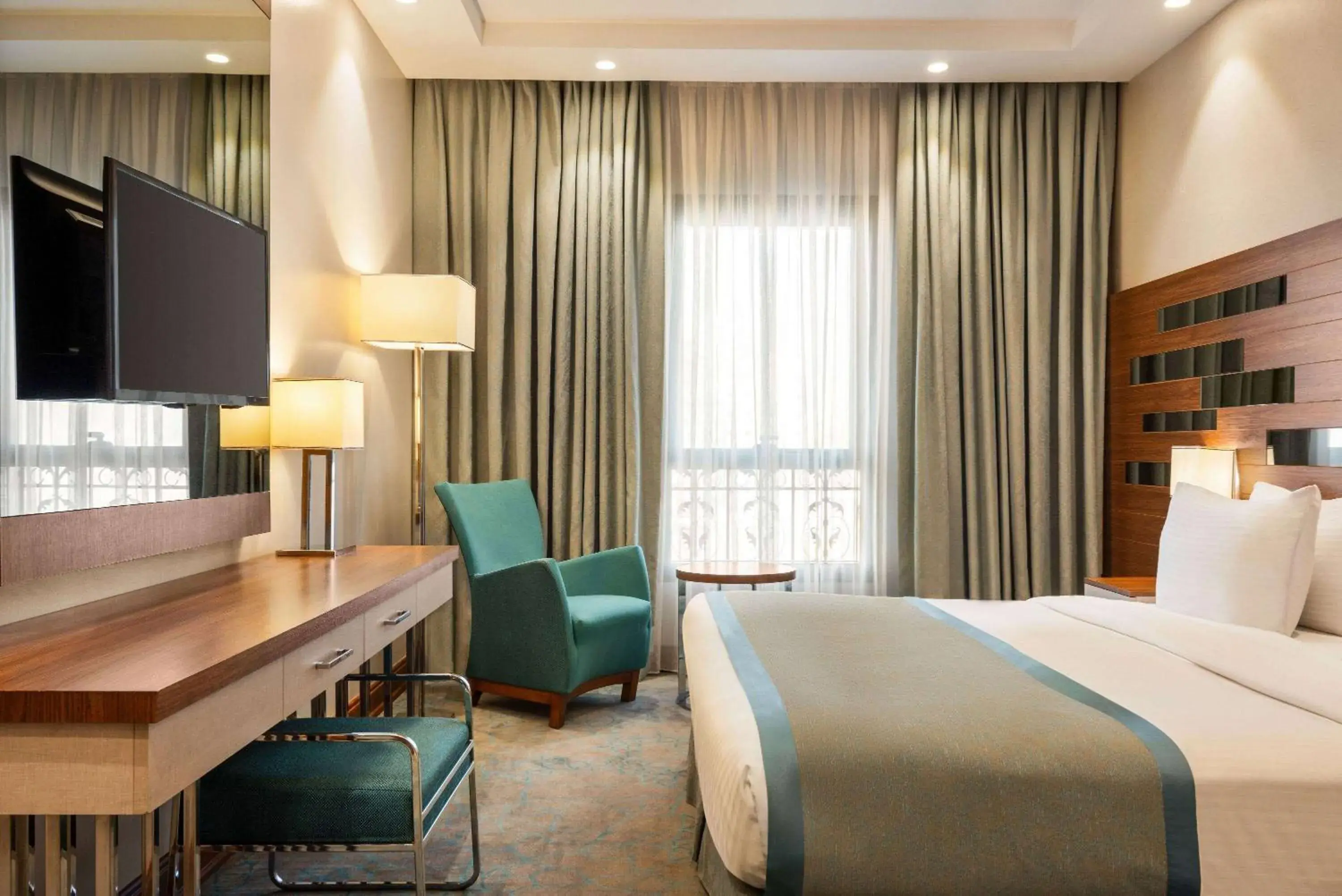 Bed in Ramada by Wyndham Makkah Zad Al Rawda Bed in Ramada by Wyndham Makkah Zad Al Rawda