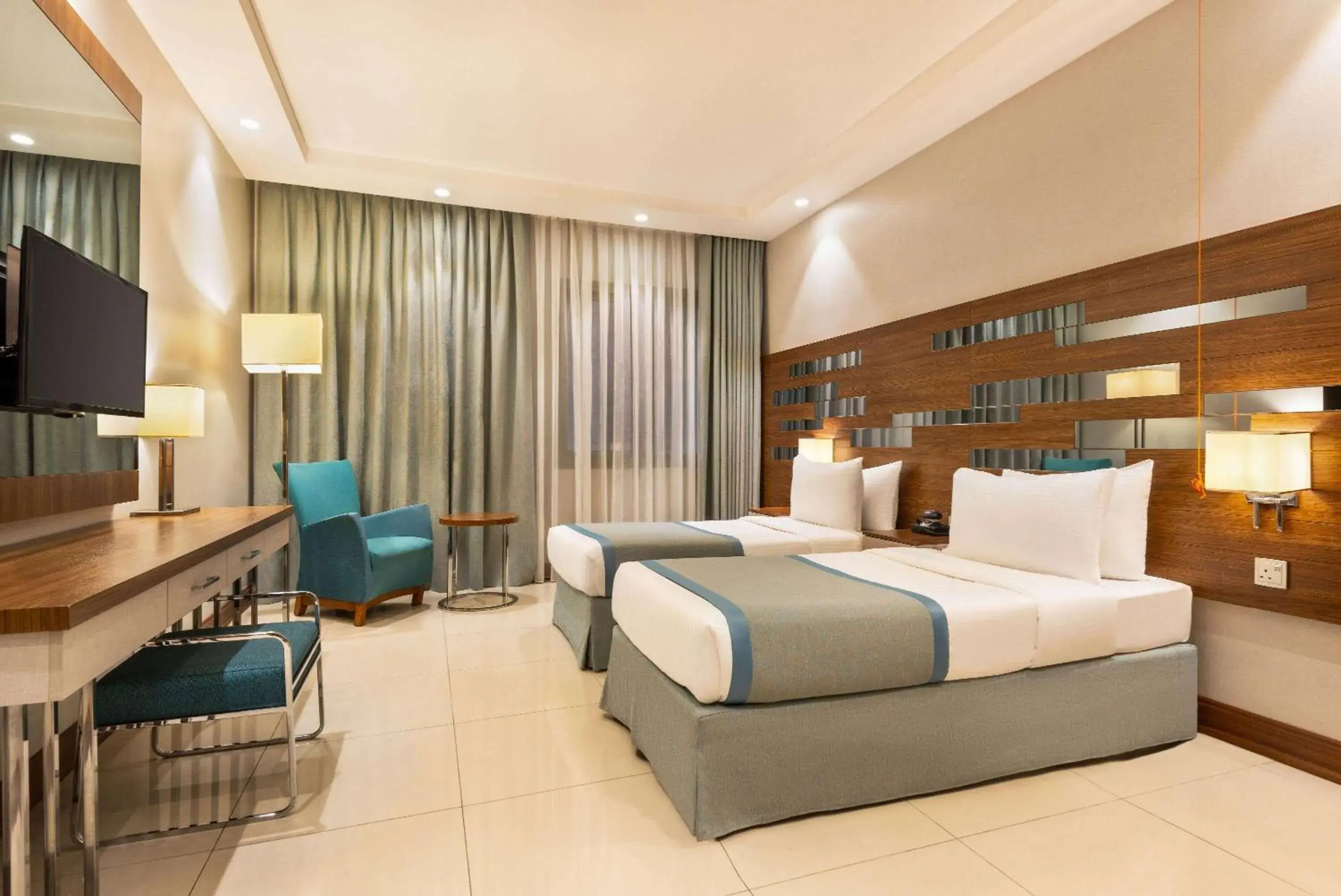 Bed in Ramada by Wyndham Makkah Zad Al Rawda Bed in Ramada by Wyndham Makkah Zad Al Rawda