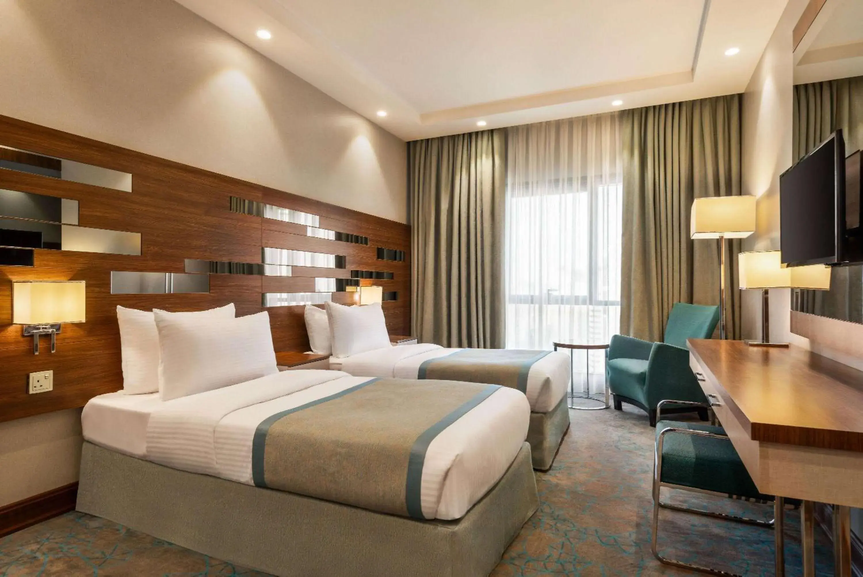 Bed in Ramada by Wyndham Makkah Zad Al Rawda Bed in Ramada by Wyndham Makkah Zad Al Rawda
