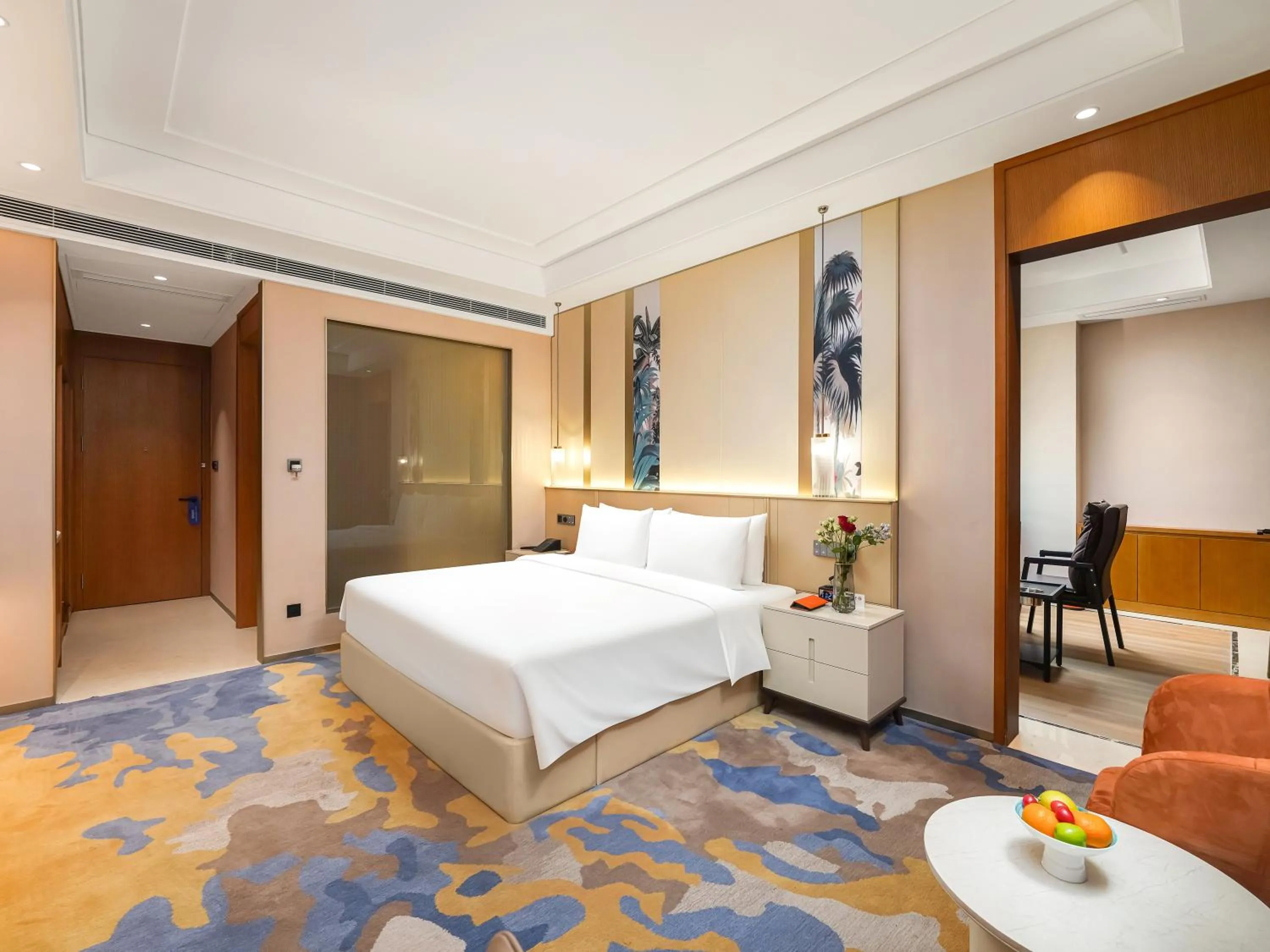 Bed in Howard Johnson by Wyndham Huaqiao Plaza Xinyu