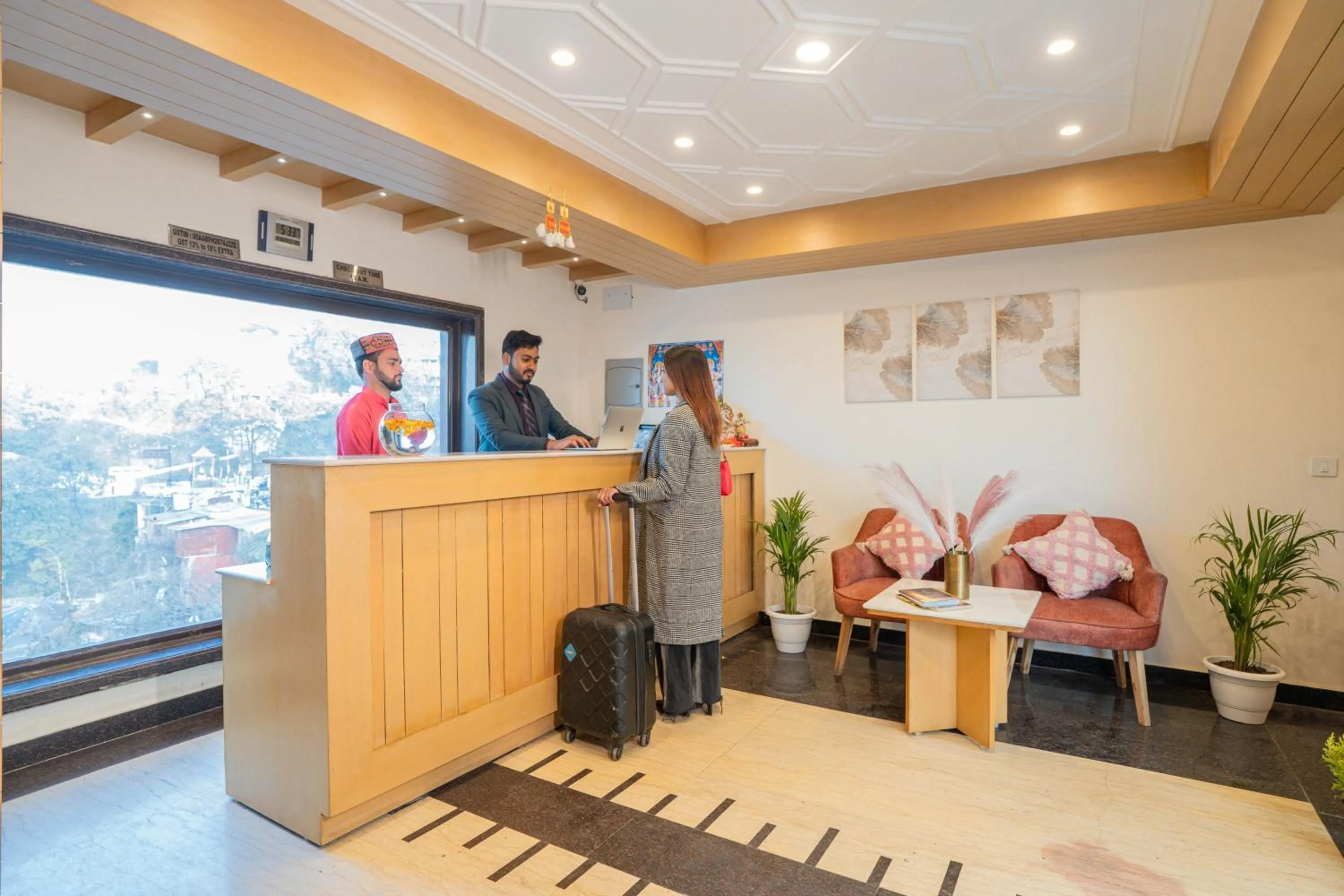 Staff in Super Hotel by Perfectstayz Mall Road