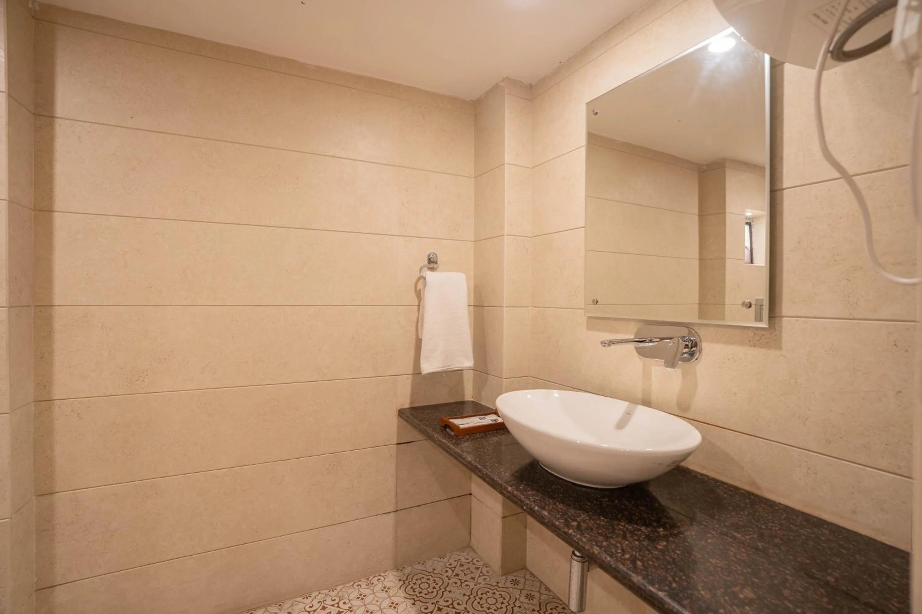 Bathroom in Super Hotel by Perfectstayz Mall Road